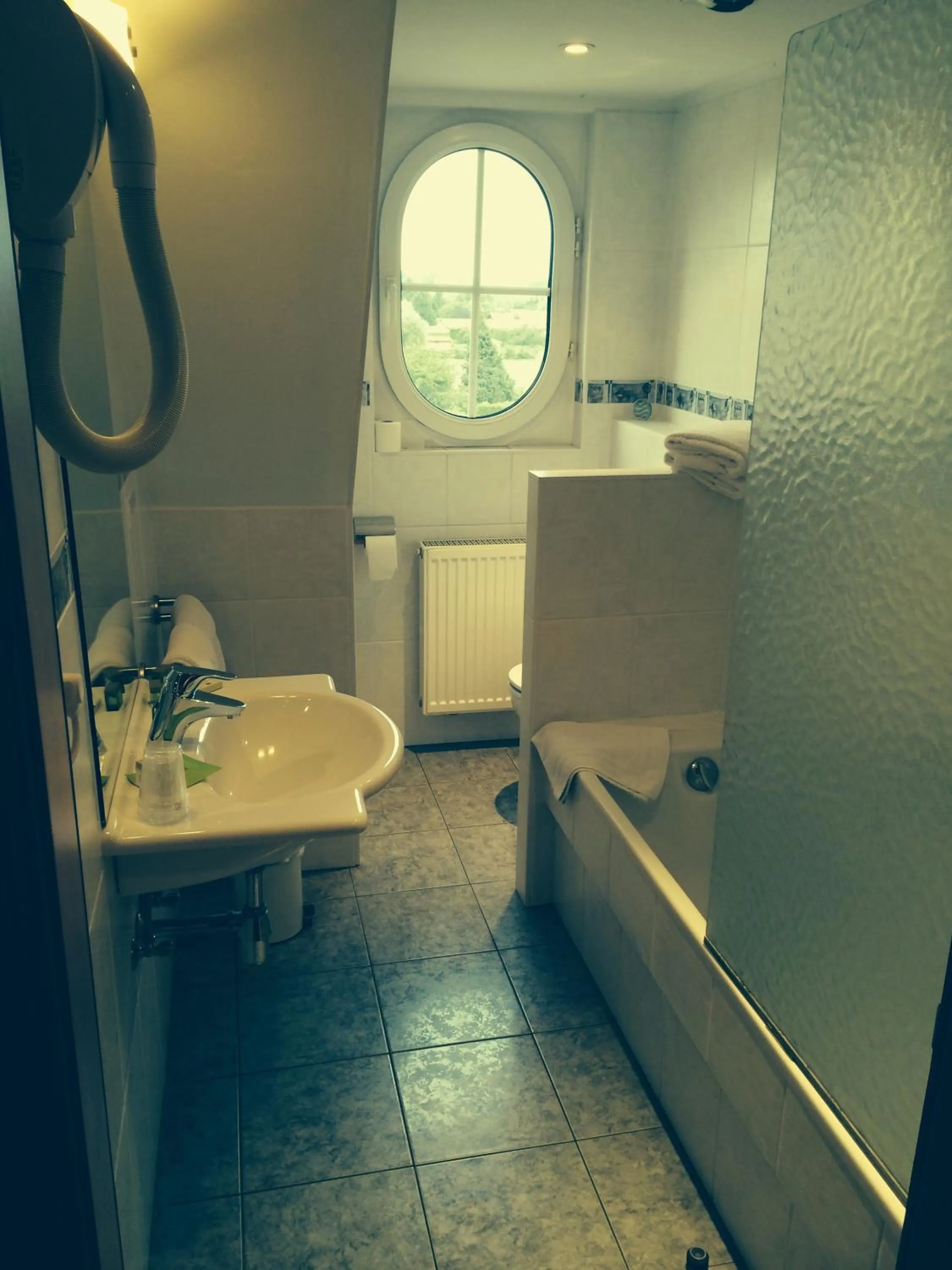 Bathroom in Logis Hôtel-Restaurant du Herrenstein