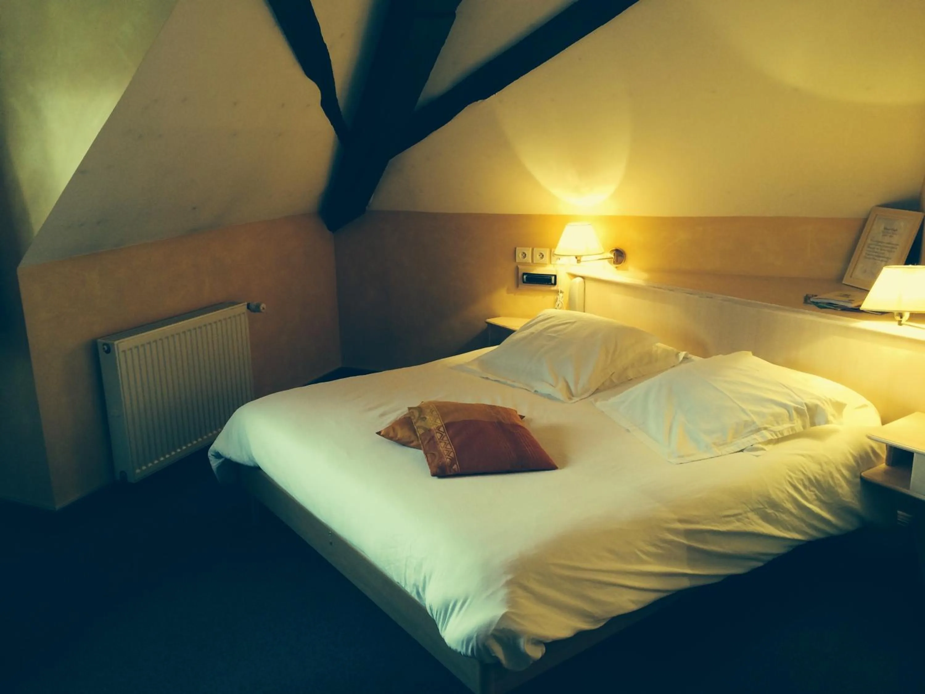 Photo of the whole room, Bed in Logis Hôtel-Restaurant du Herrenstein