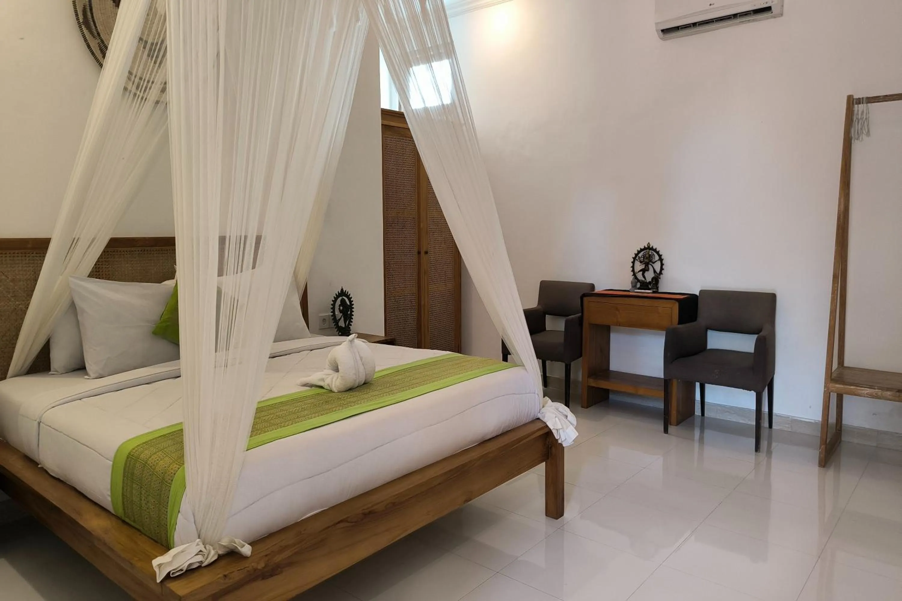 Bed in Bhuana Shanti Homestay Ubud