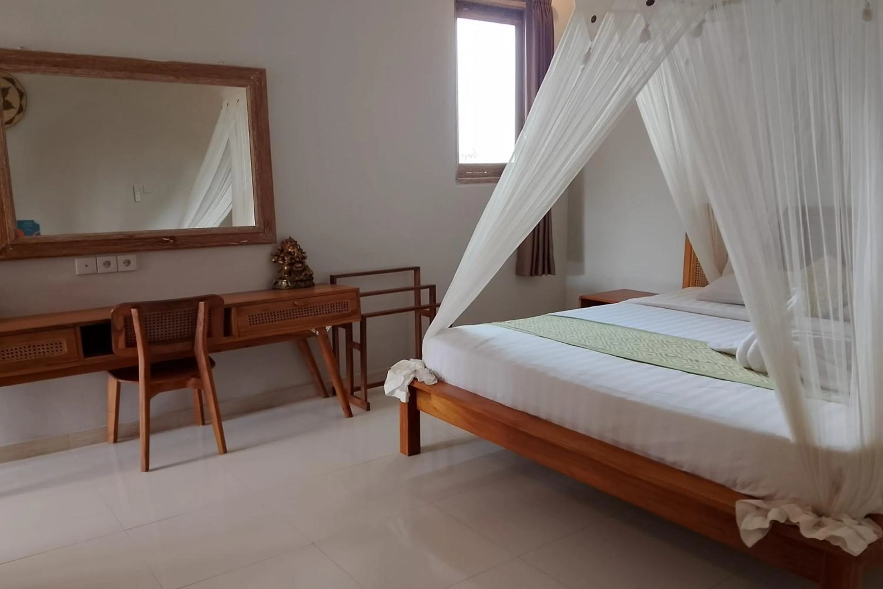 Bed in Bhuana Shanti Homestay Ubud