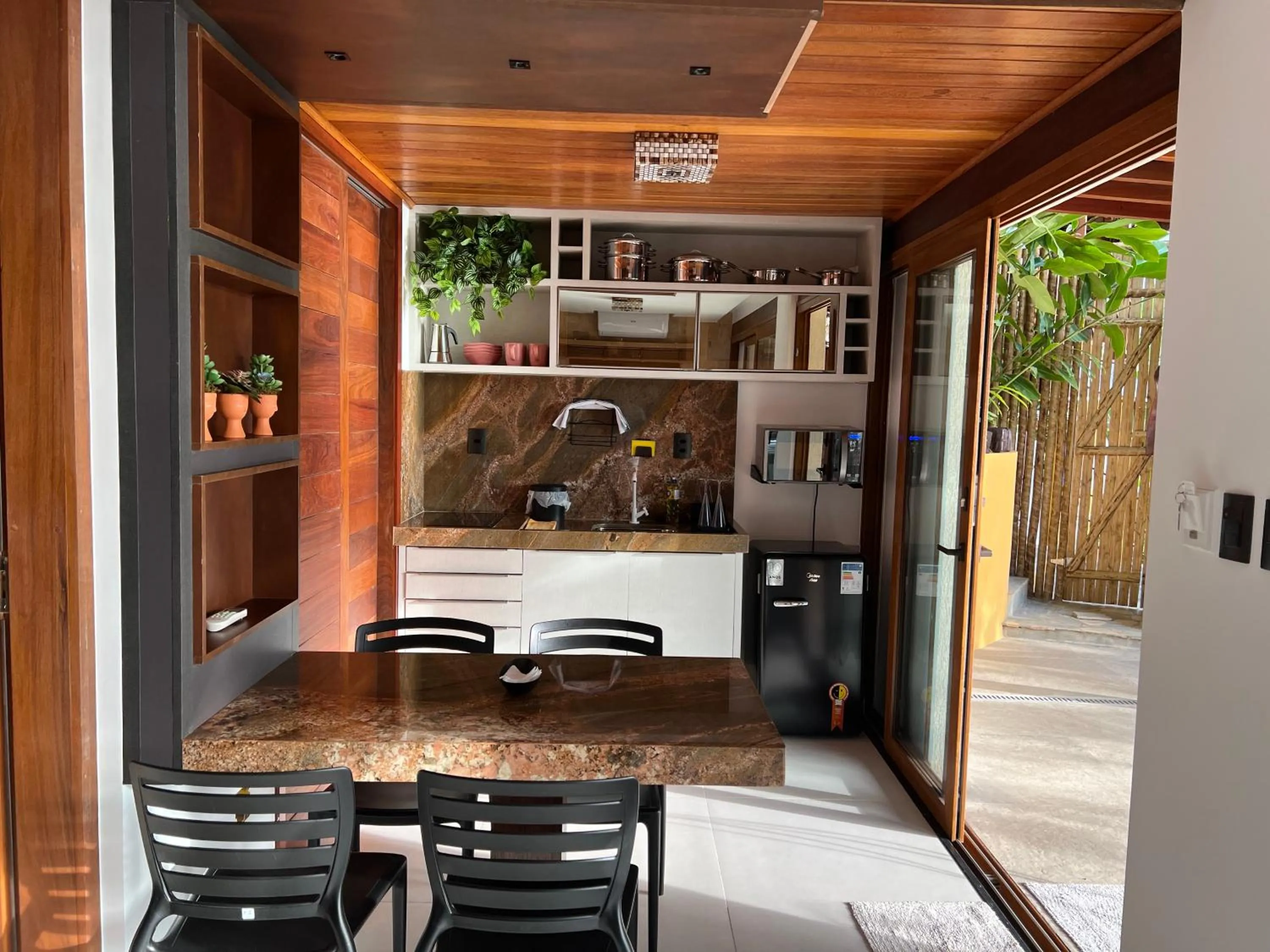 Kitchen or kitchenette in Passárgada Pousada