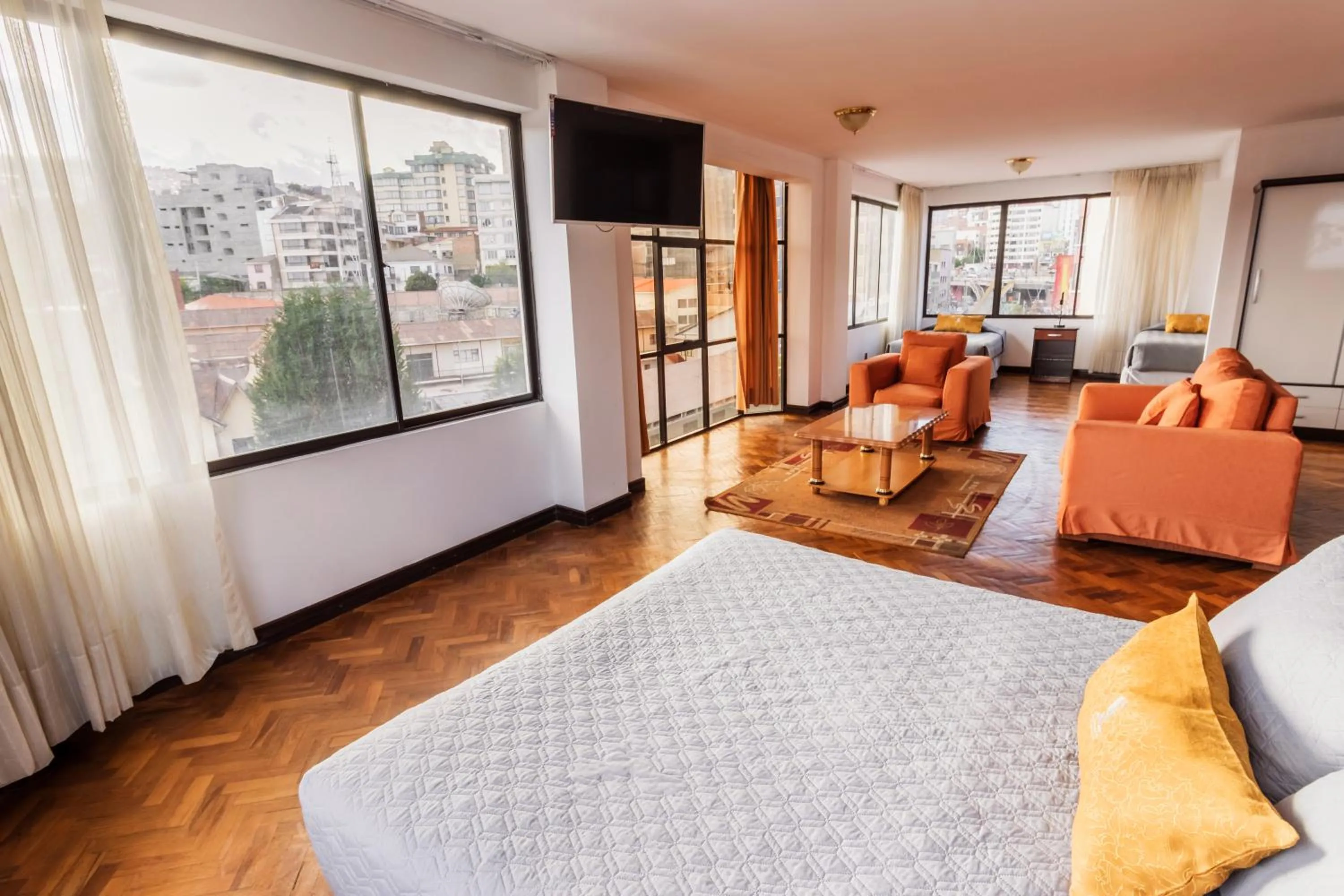 Living room, Bed in Elegance Hotel