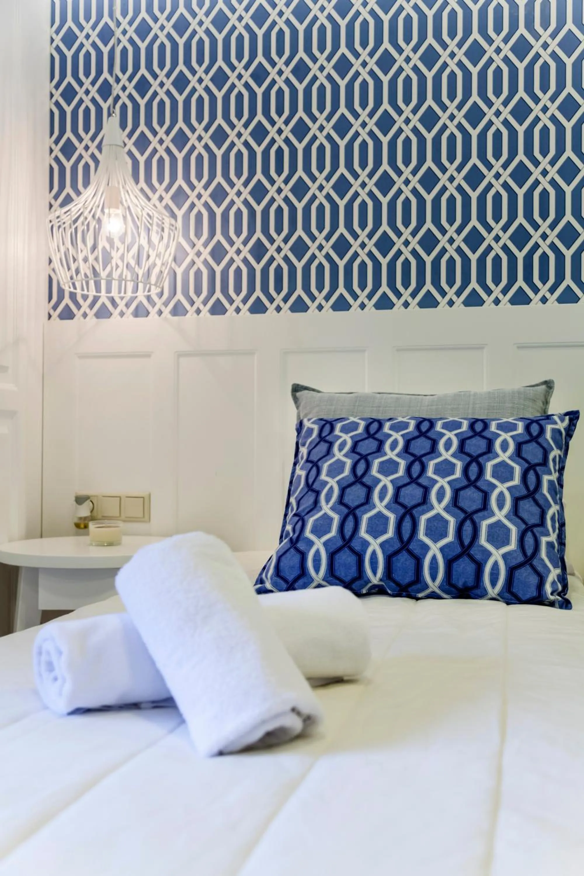 Bed in Candia Studios & Rooms