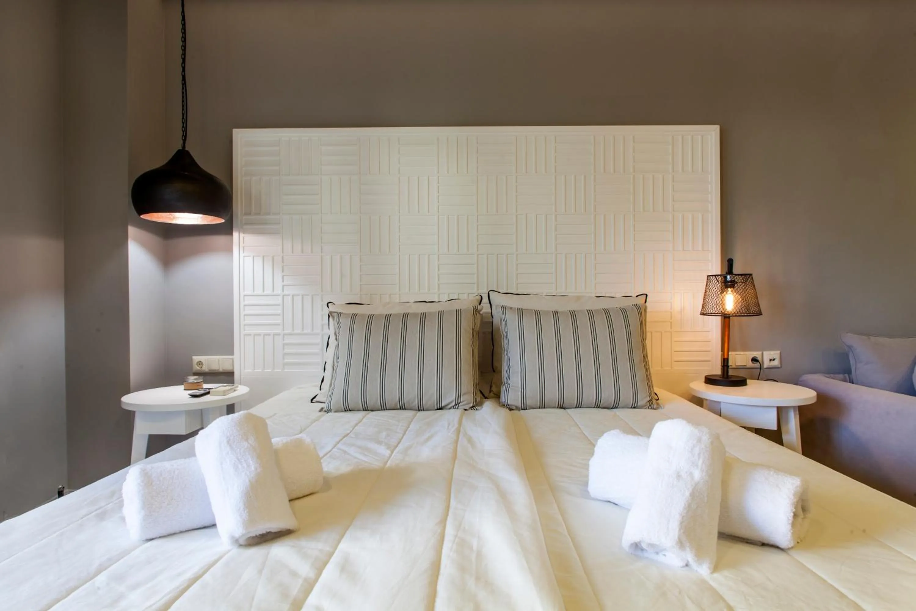 Bed in Candia Studios & Rooms