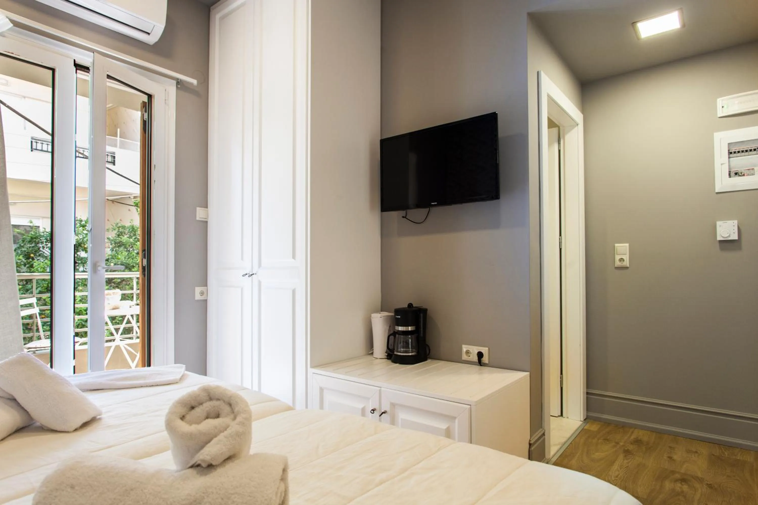 Bed in Candia Studios & Rooms