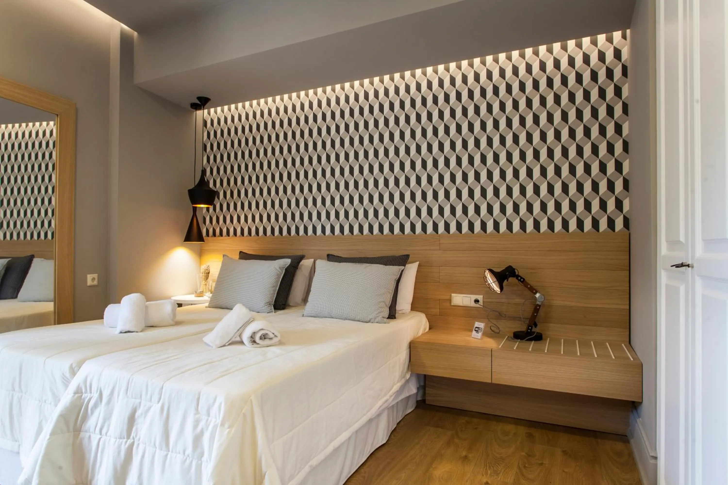 Bed in Candia Studios & Rooms