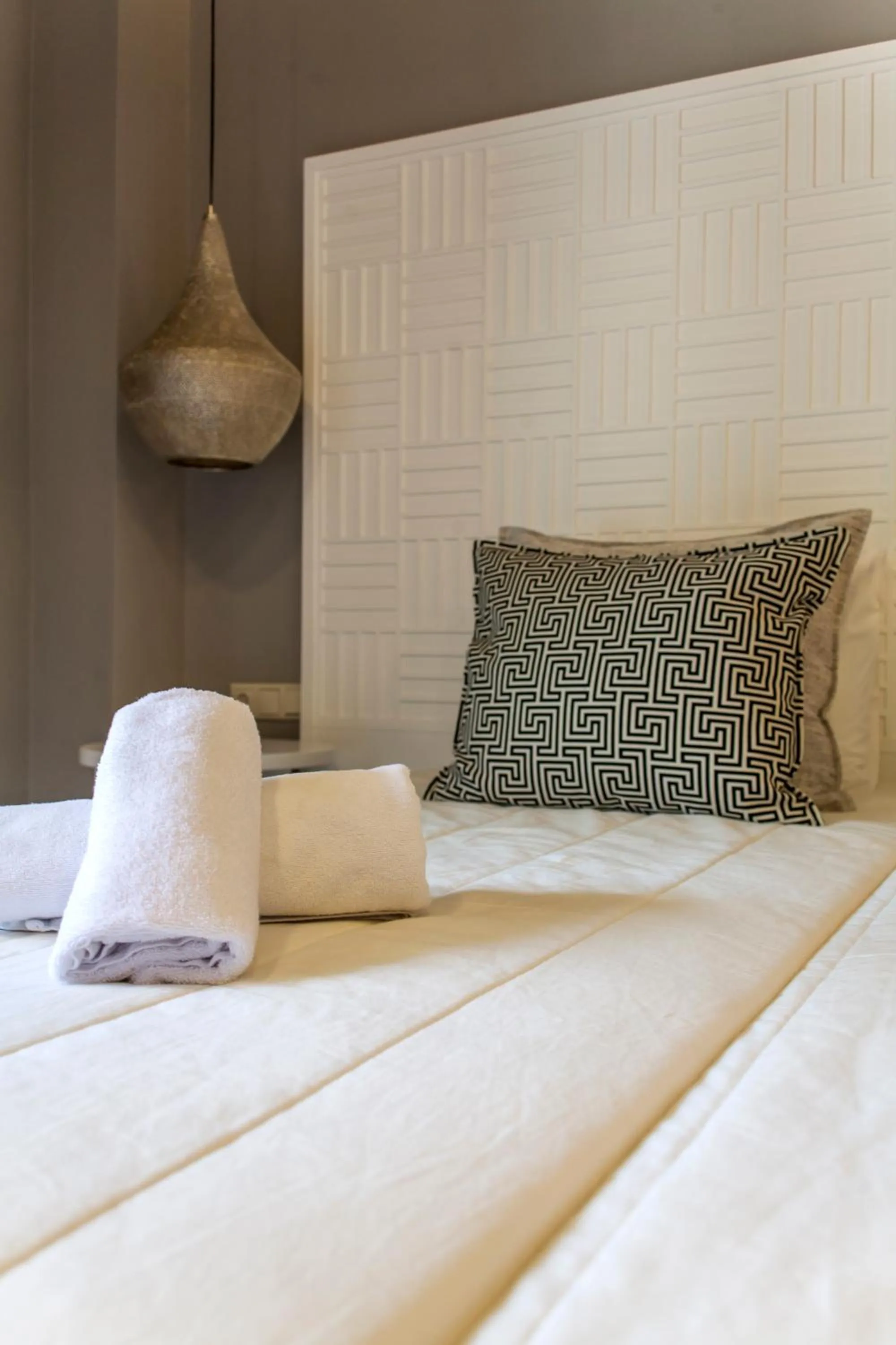 Bed in Candia Studios & Rooms