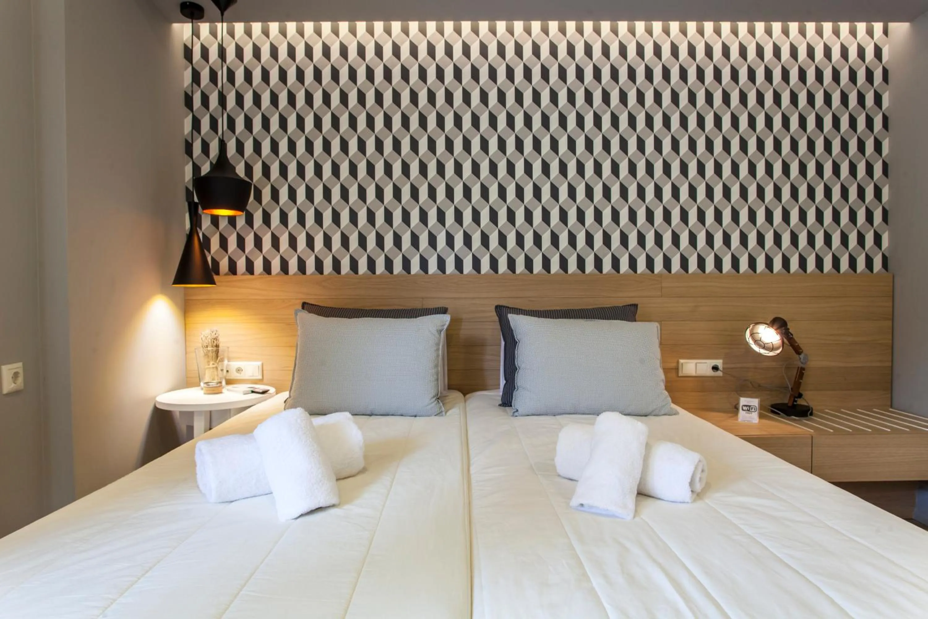 Bed in Candia Studios & Rooms