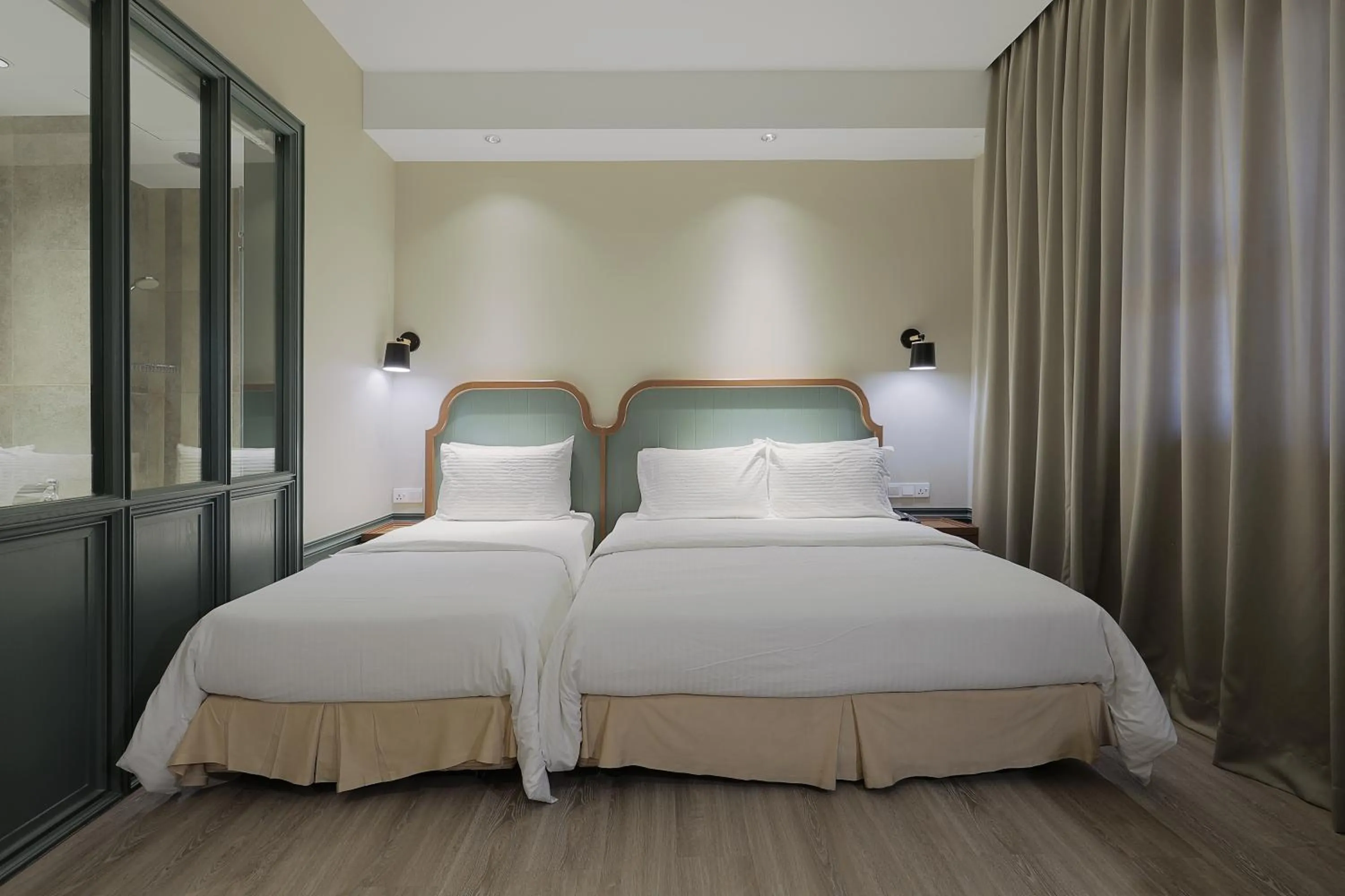 Bed in The Jesselton Hotel