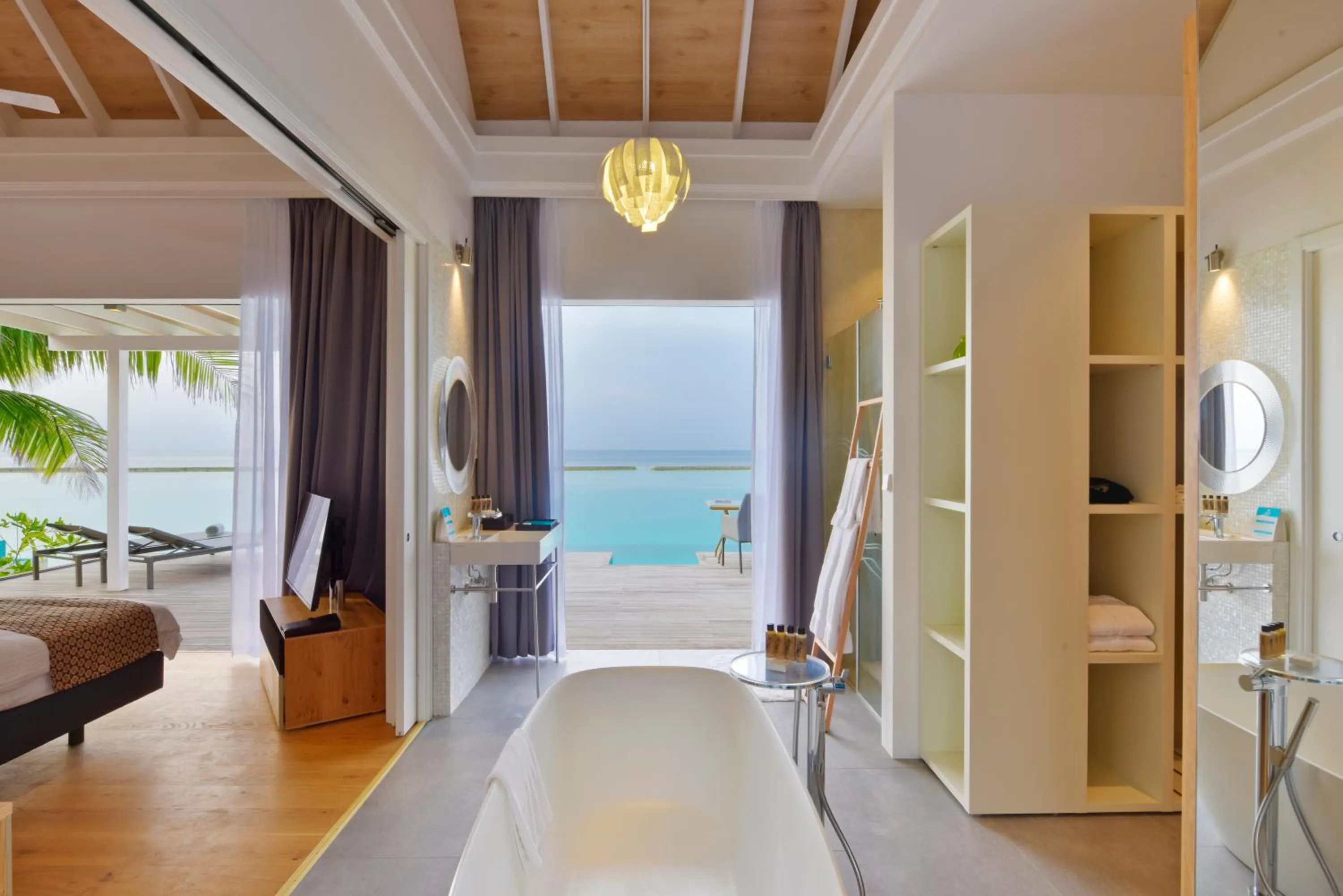 Bathroom, Bed in Kuramathi Maldives