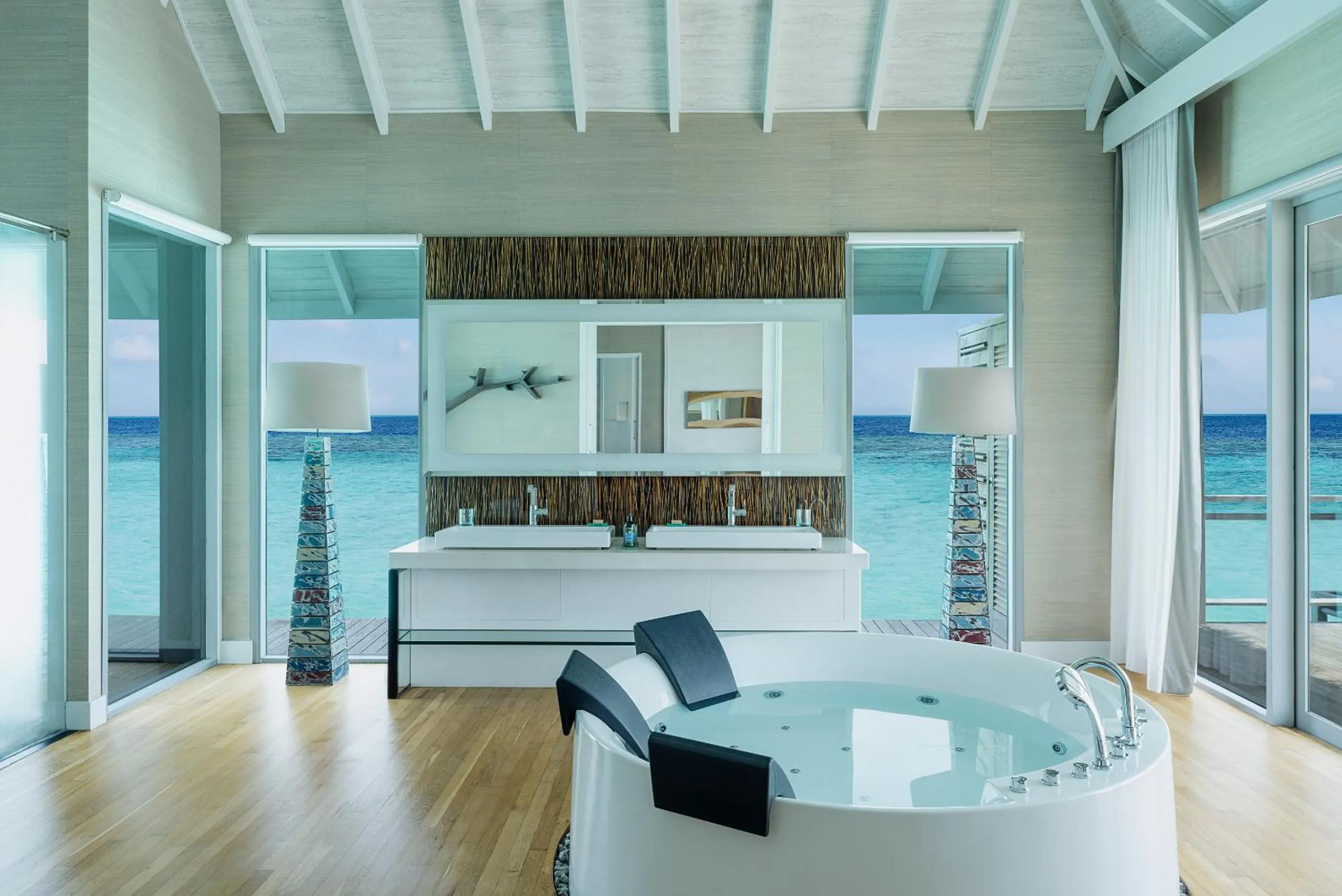 Bathroom, Bed in Velassaru Maldives