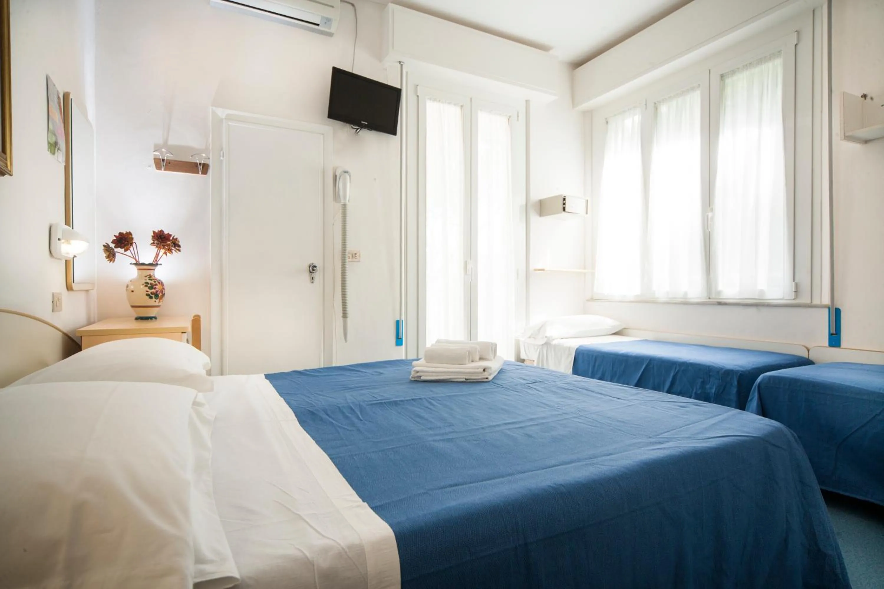 Bed in Hotel Erika