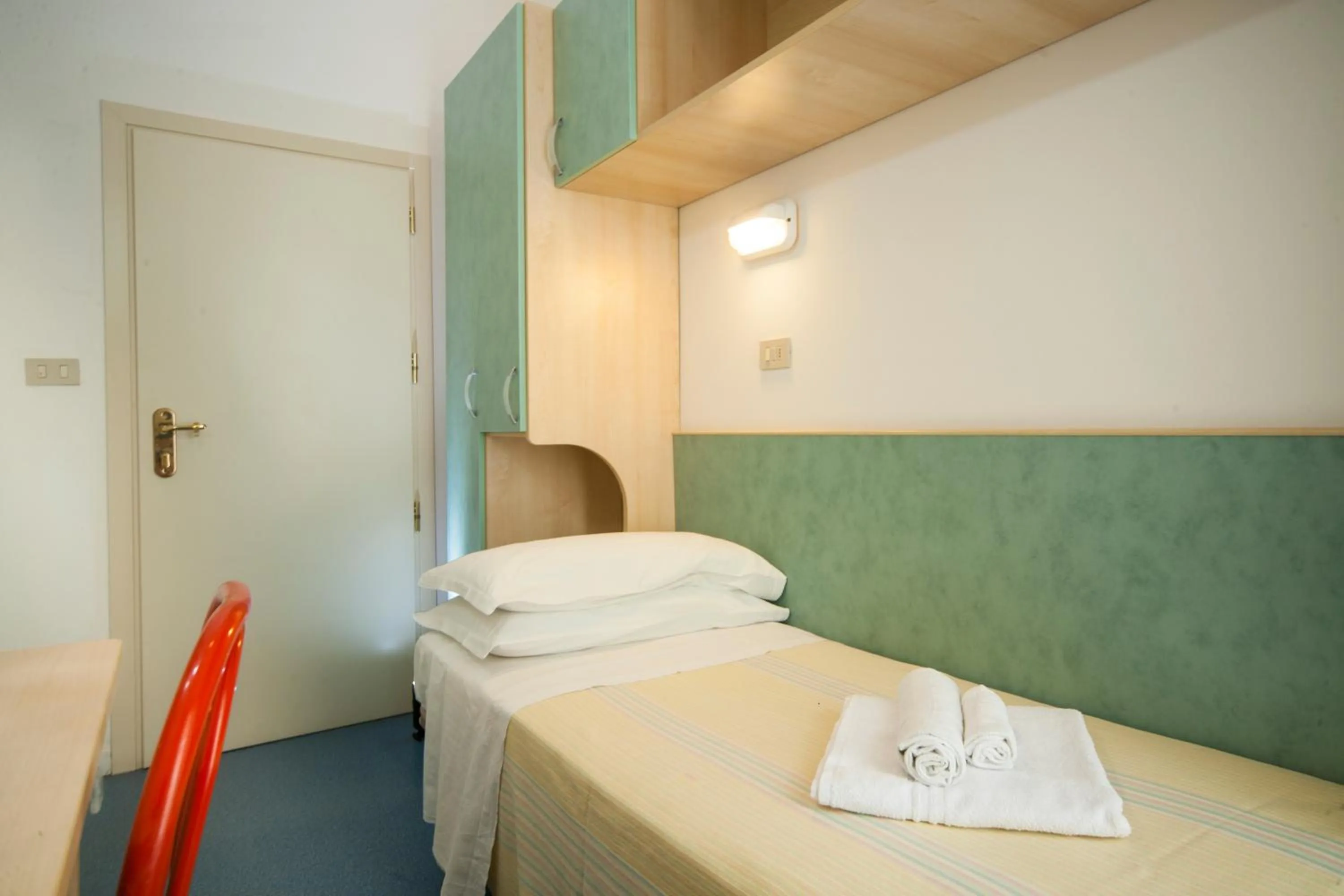 Bed in Hotel Erika