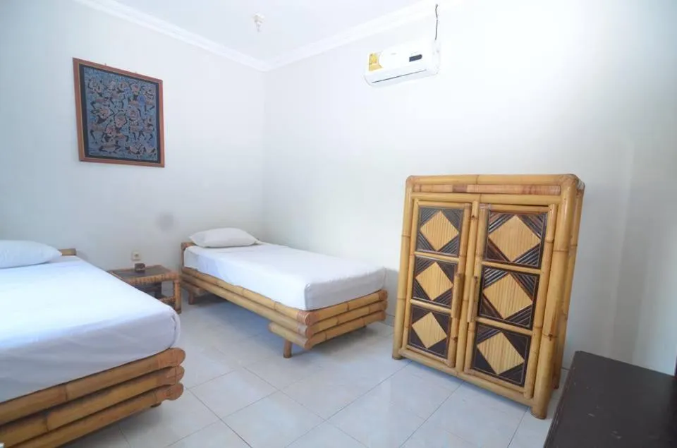 Bed in Puri Itoma Bungalows