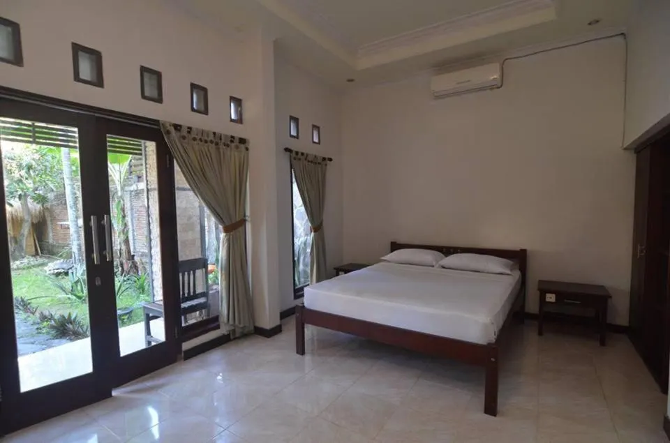 Bed in Puri Itoma Bungalows