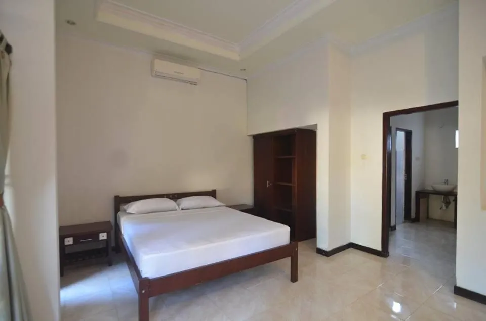 Bed in Puri Itoma Bungalows