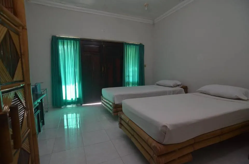 Bed in Puri Itoma Bungalows