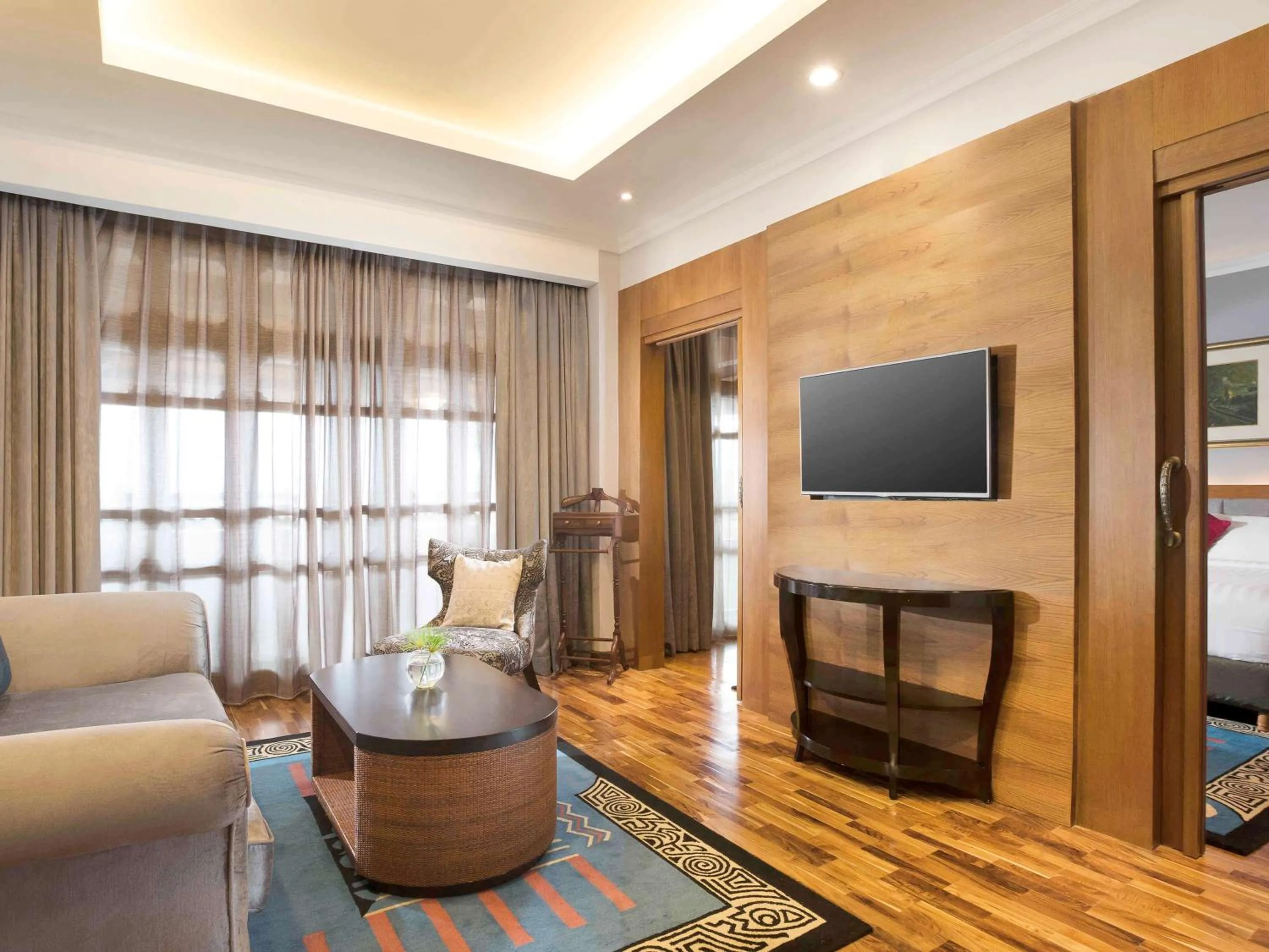 Photo of the whole room, TV/Entertainment Center in Novotel Bukittinggi