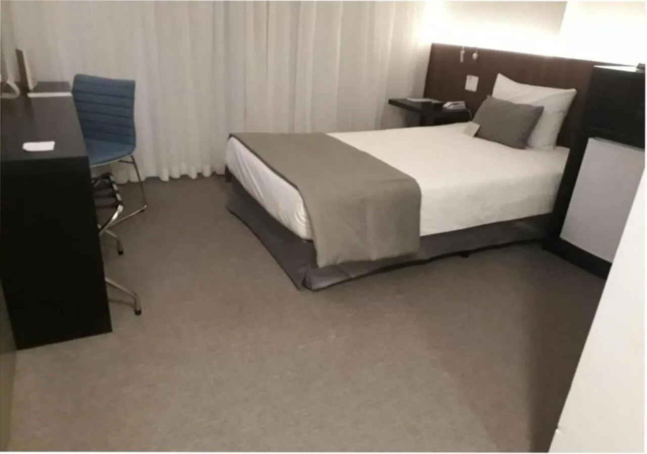 Bedroom, Bed in Wyndham Garden Ribeirão Preto Convention