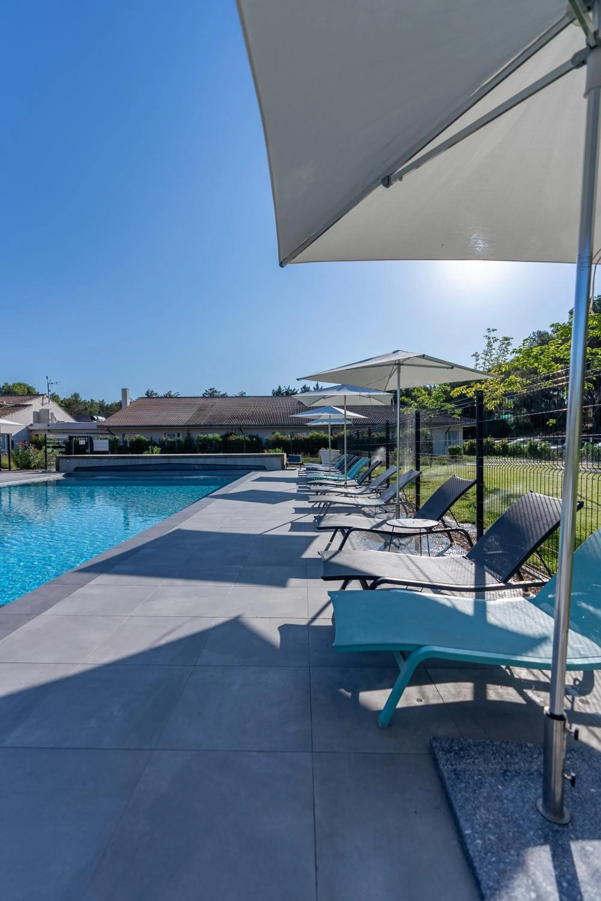 Swimming pool in Kyriad Résidence Cabriès - Plan de Campagne