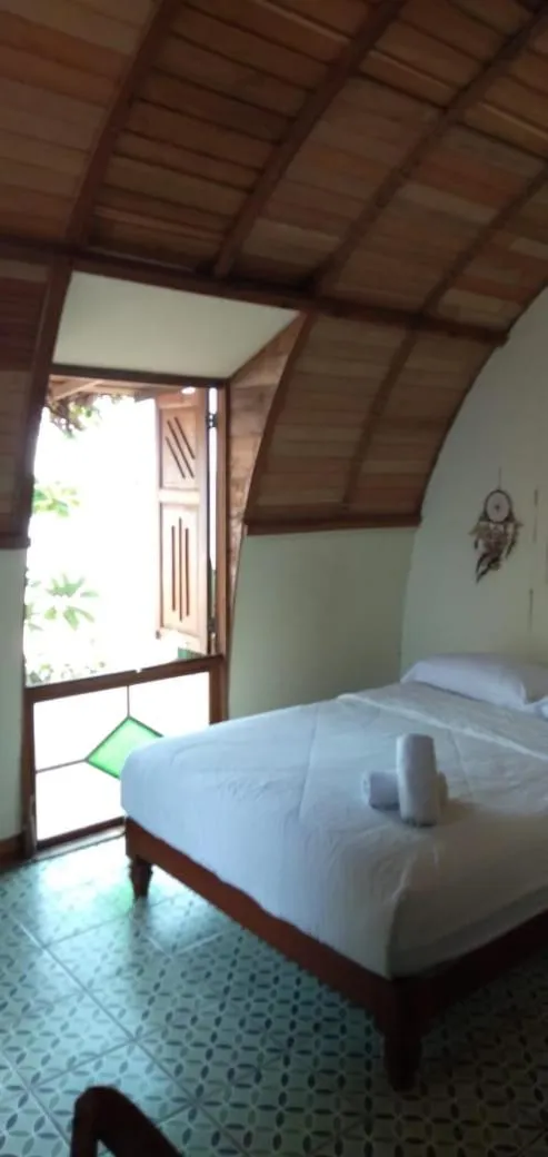 Bed in Villa Isabella Putri B&B