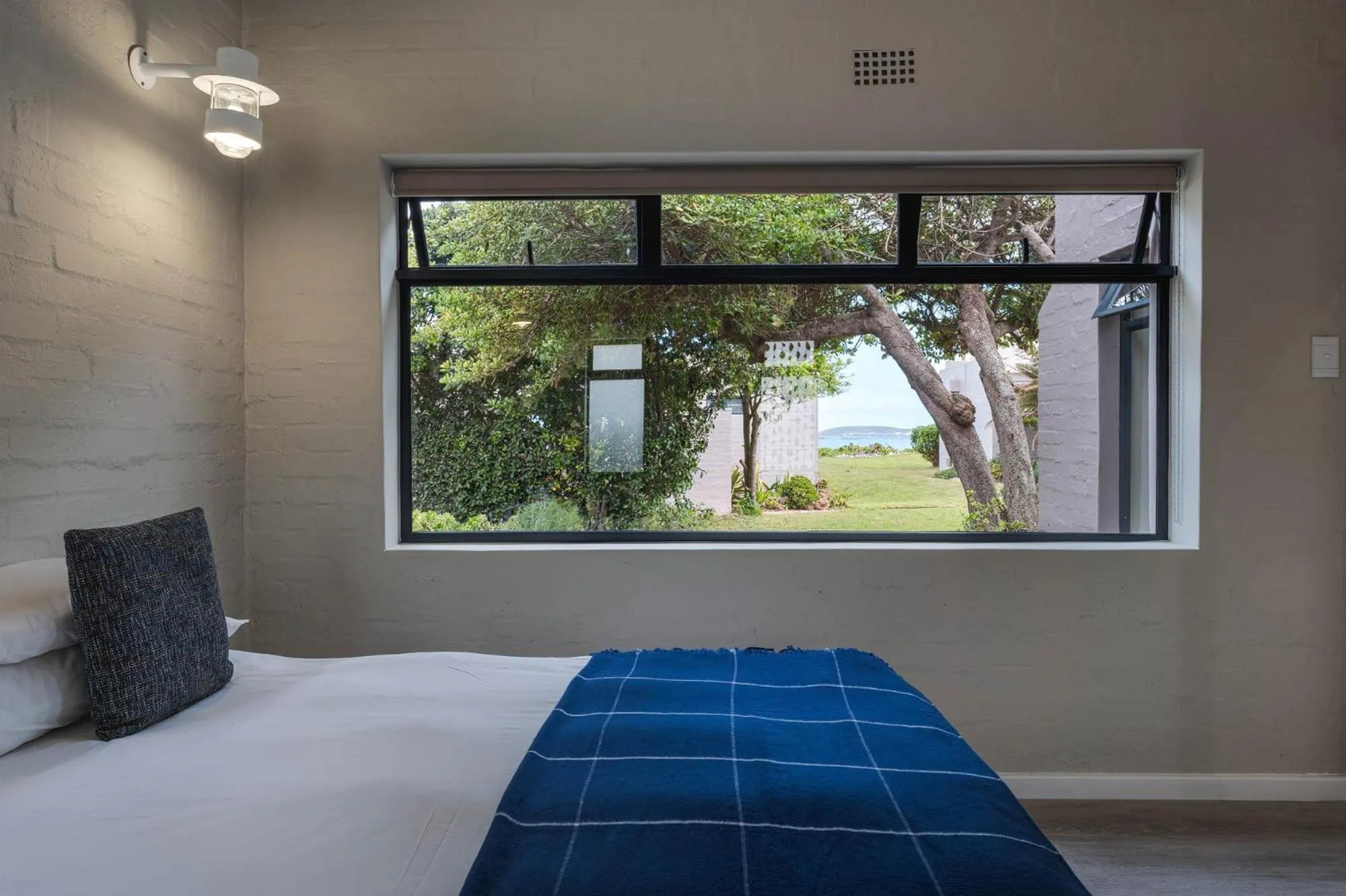 Bed in Blue Bay Lodge