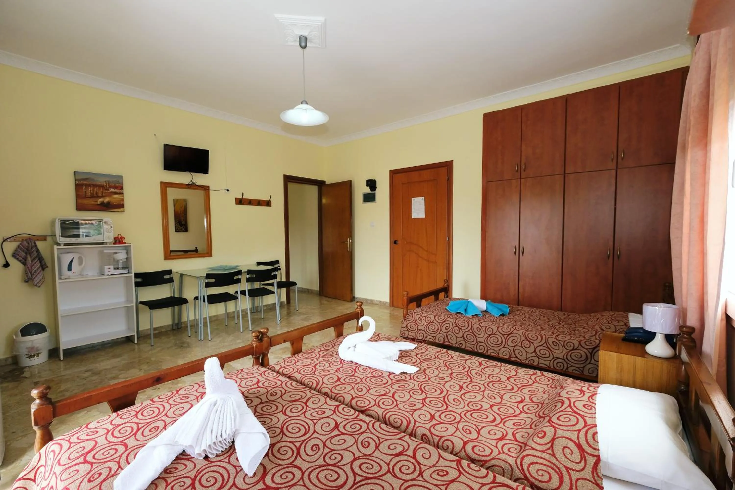 Bed in Apollo Pavilion Apartments