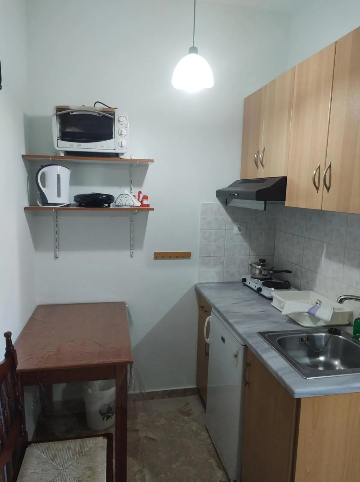 Kitchen or kitchenette in Apollo Pavilion Apartments