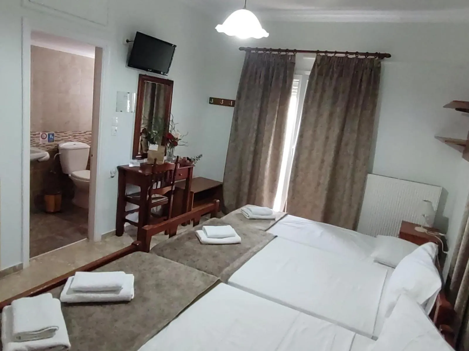 Landmark view, Bed in Apollo Pavilion Apartments
