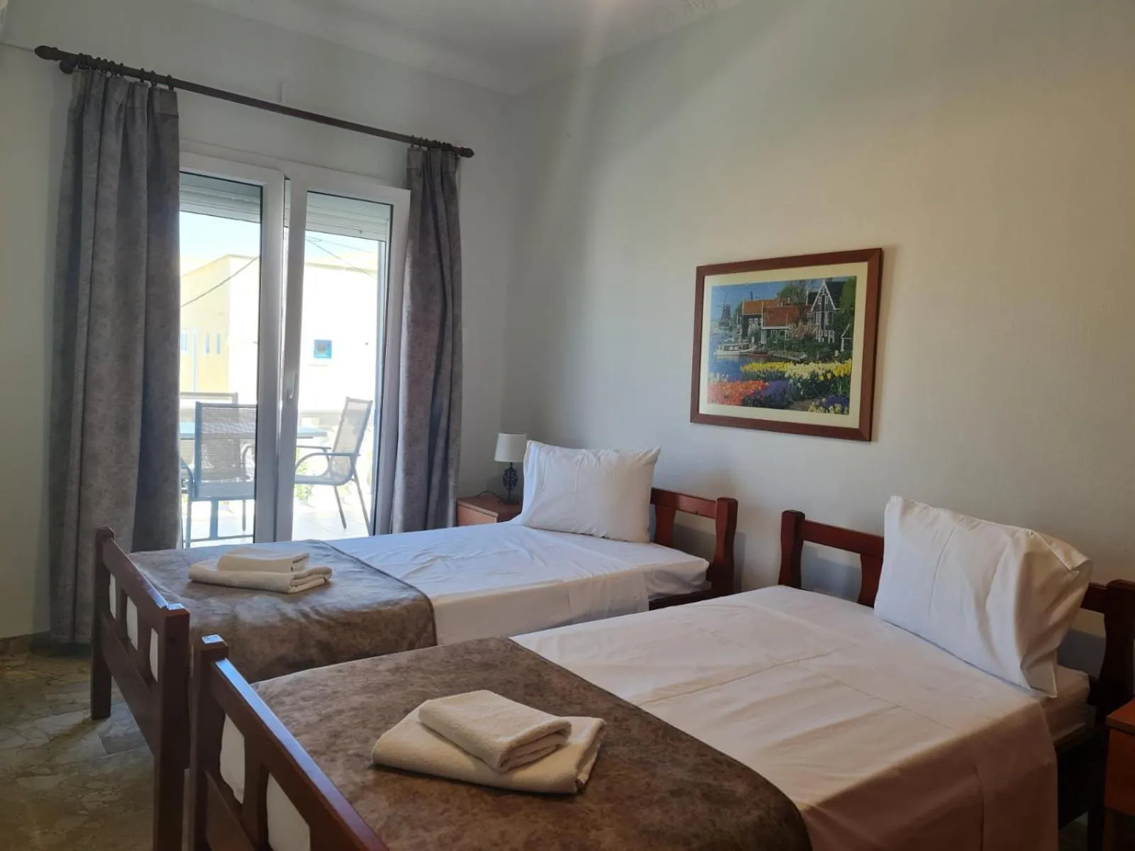 Quiet street view, Bed in Apollo Pavilion Apartments