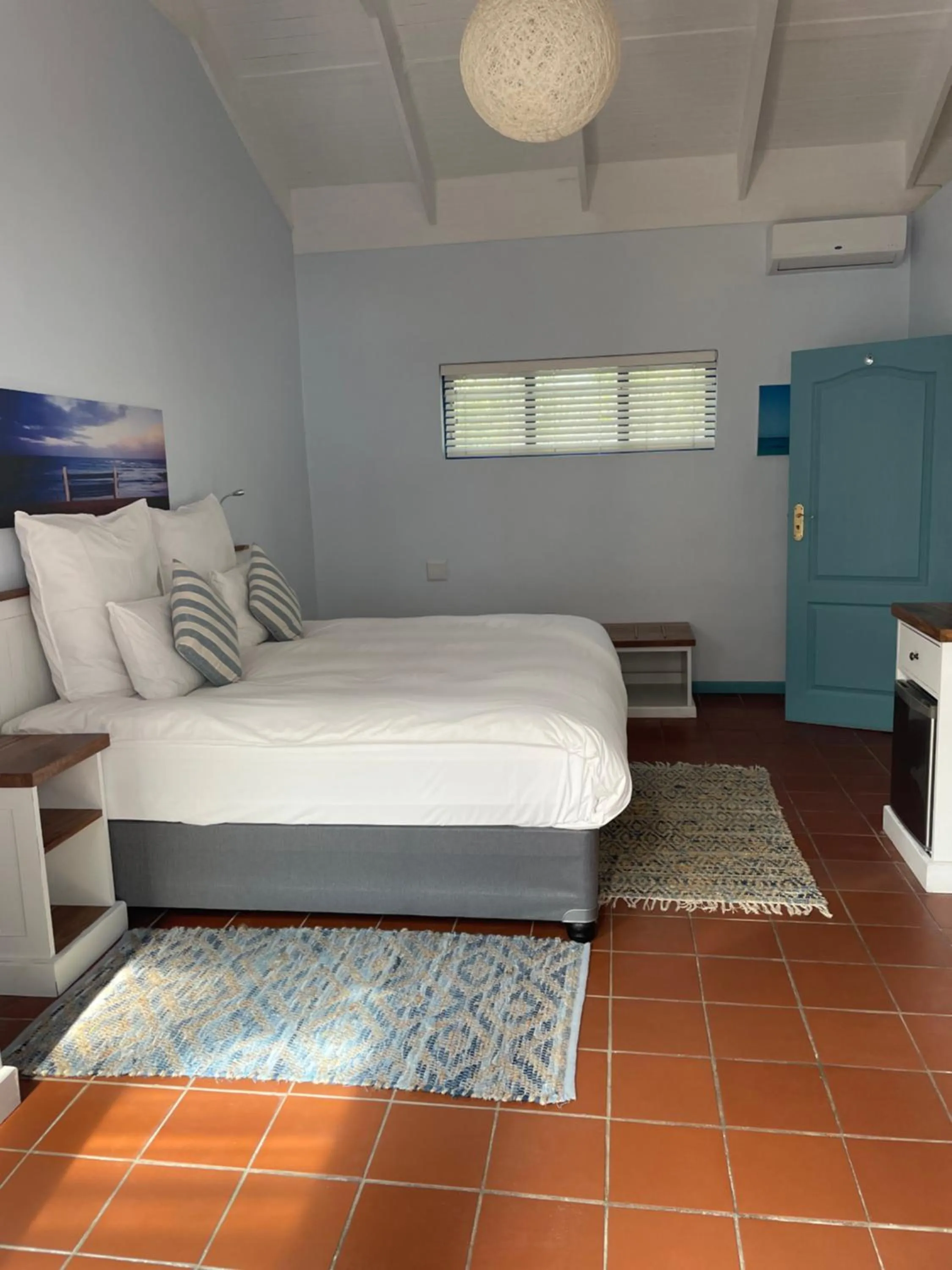 Bed in BlueSky Arniston Guest House