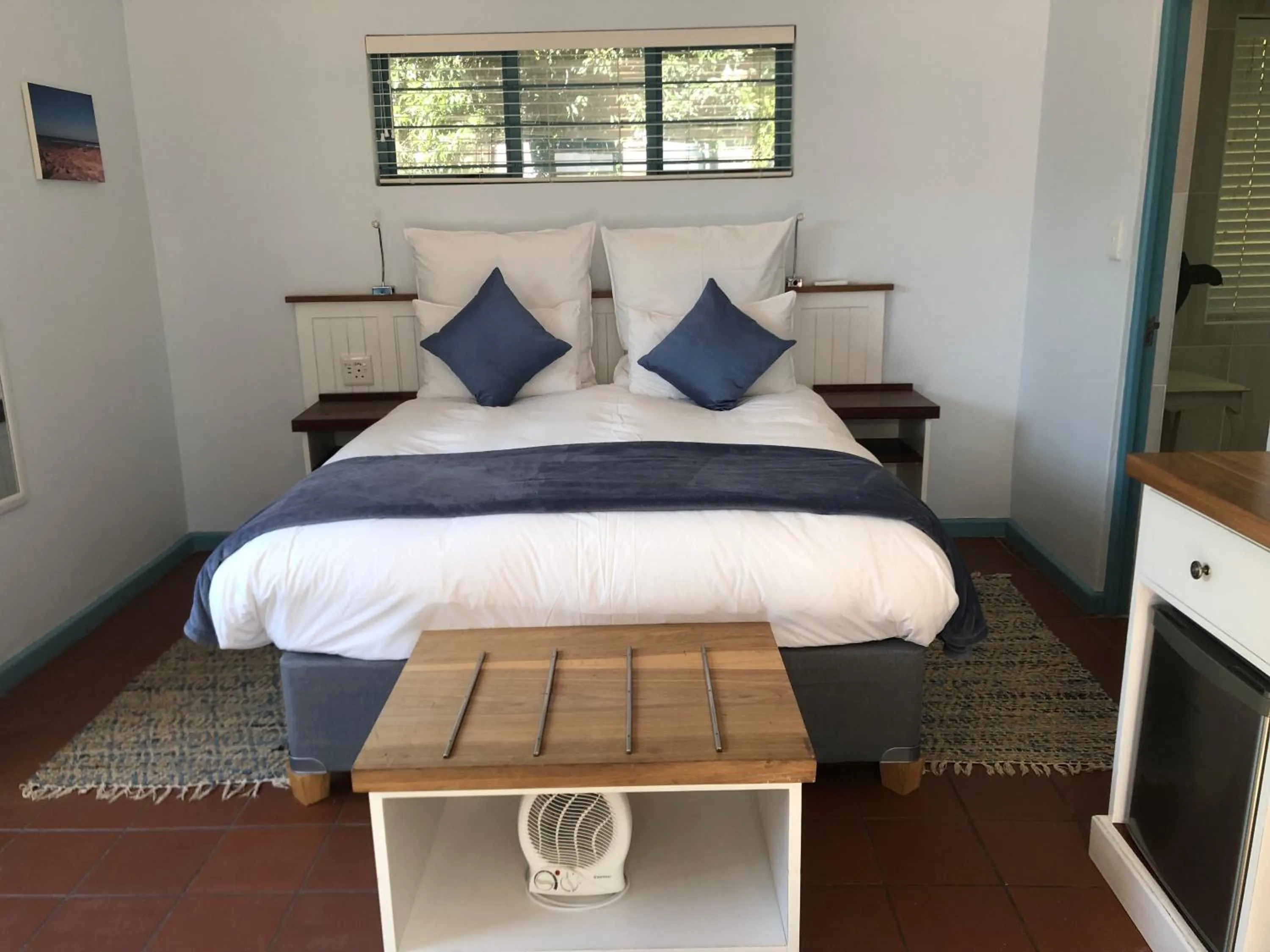 Bed in BlueSky Arniston Guest House