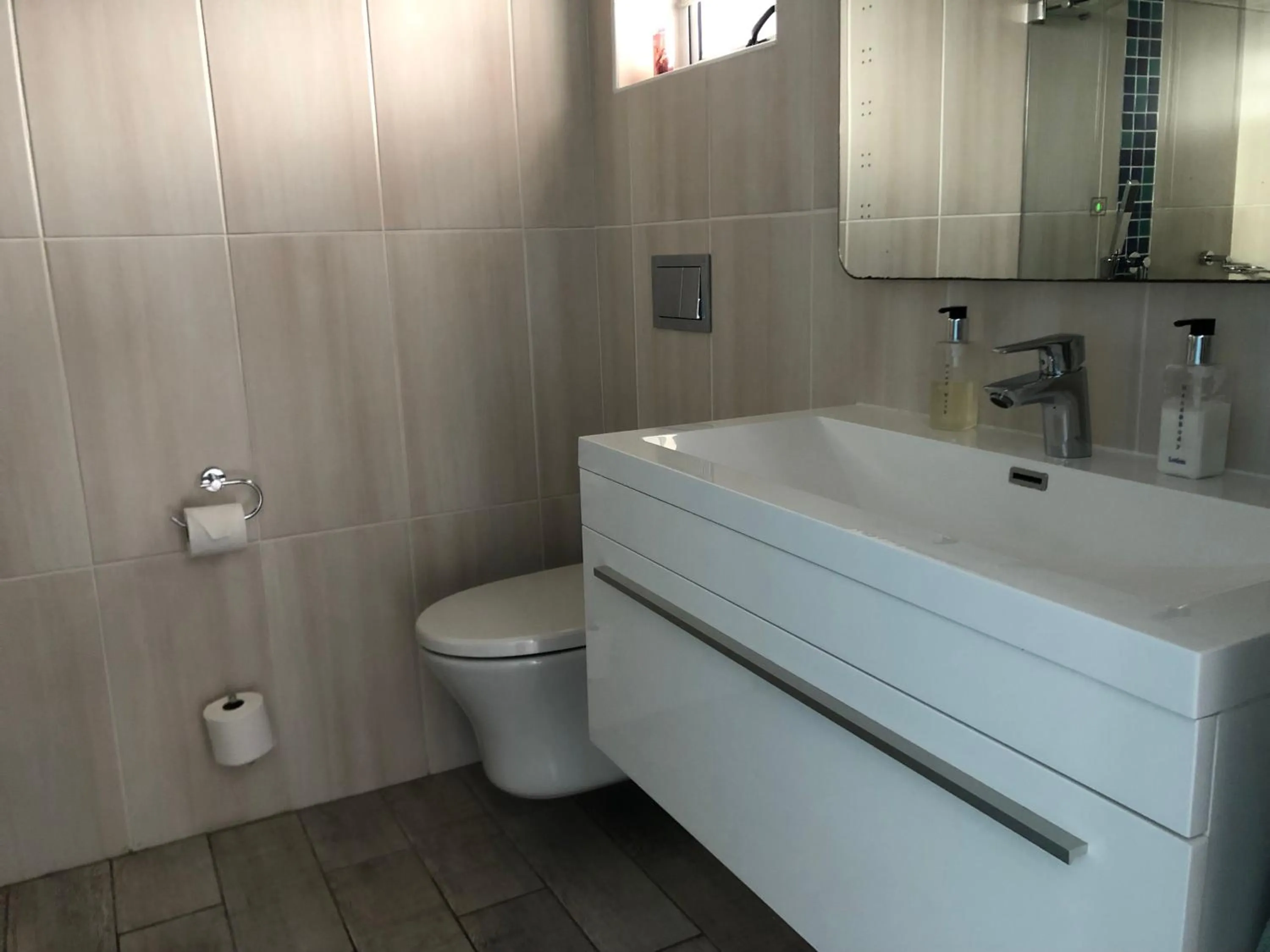 Toilet in BlueSky Arniston Guest House