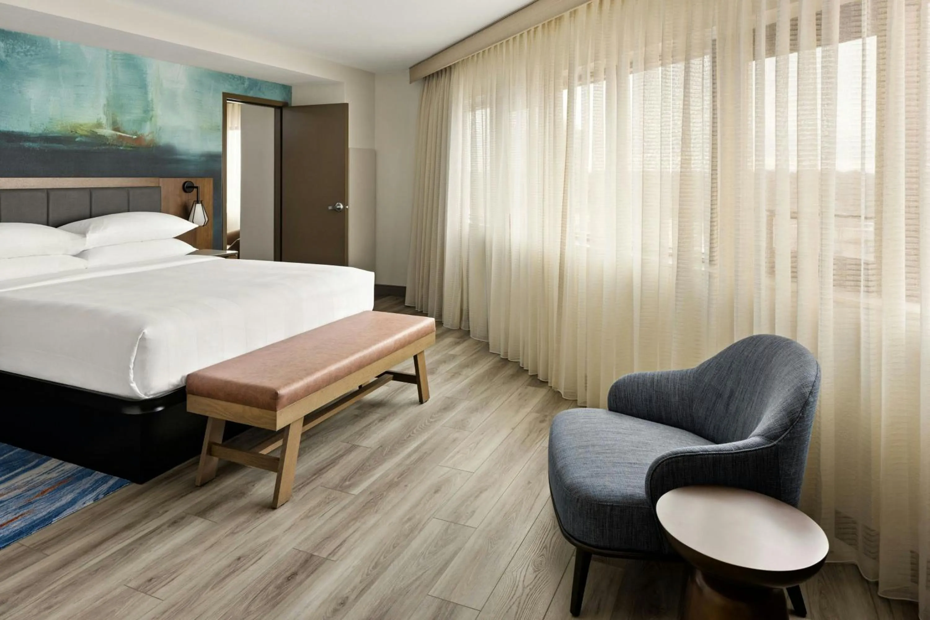 Photo of the whole room, Bed in Oshkosh Marriott Waterfront Hotel & Convention Center