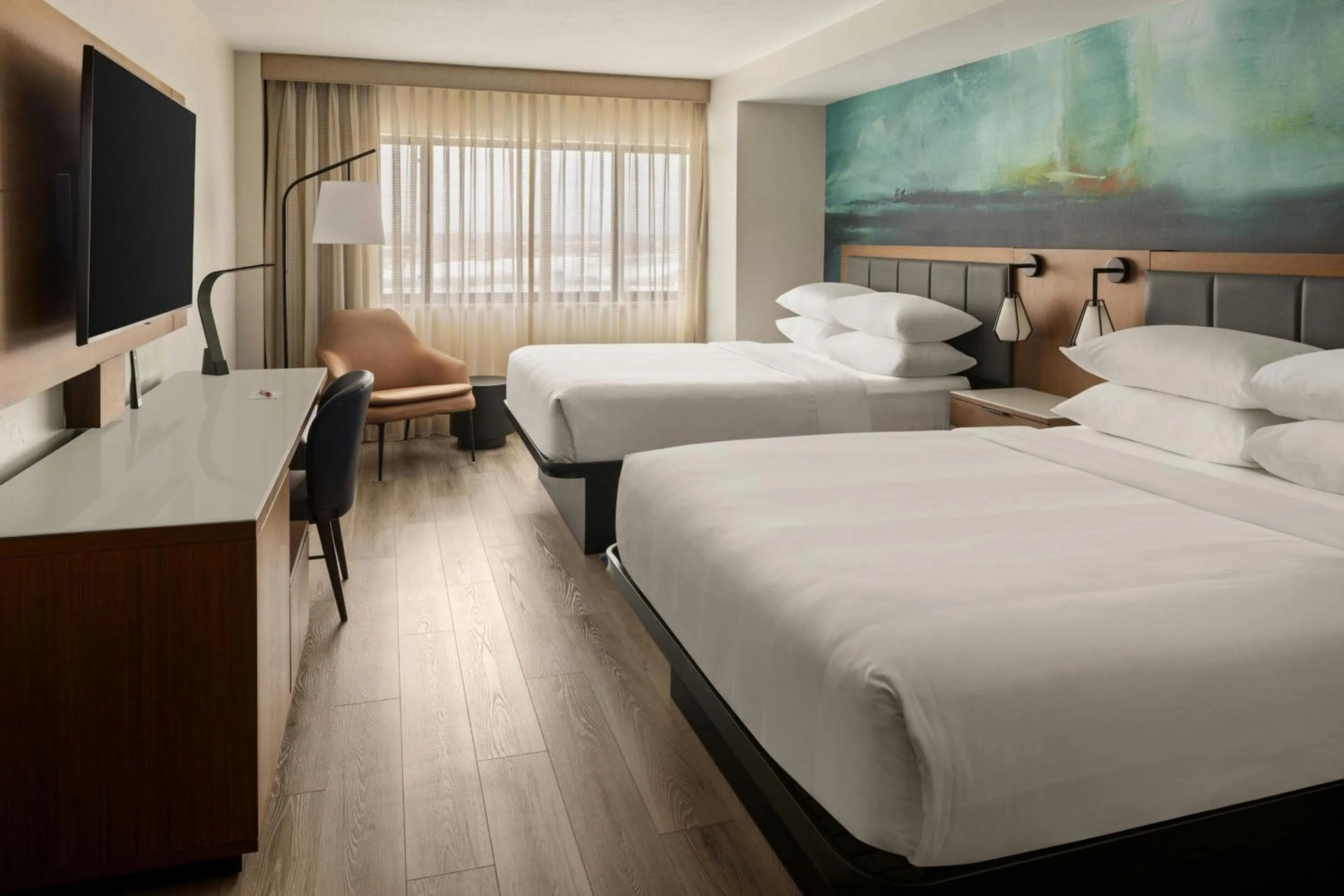 Photo of the whole room, Bed in Oshkosh Marriott Waterfront Hotel & Convention Center