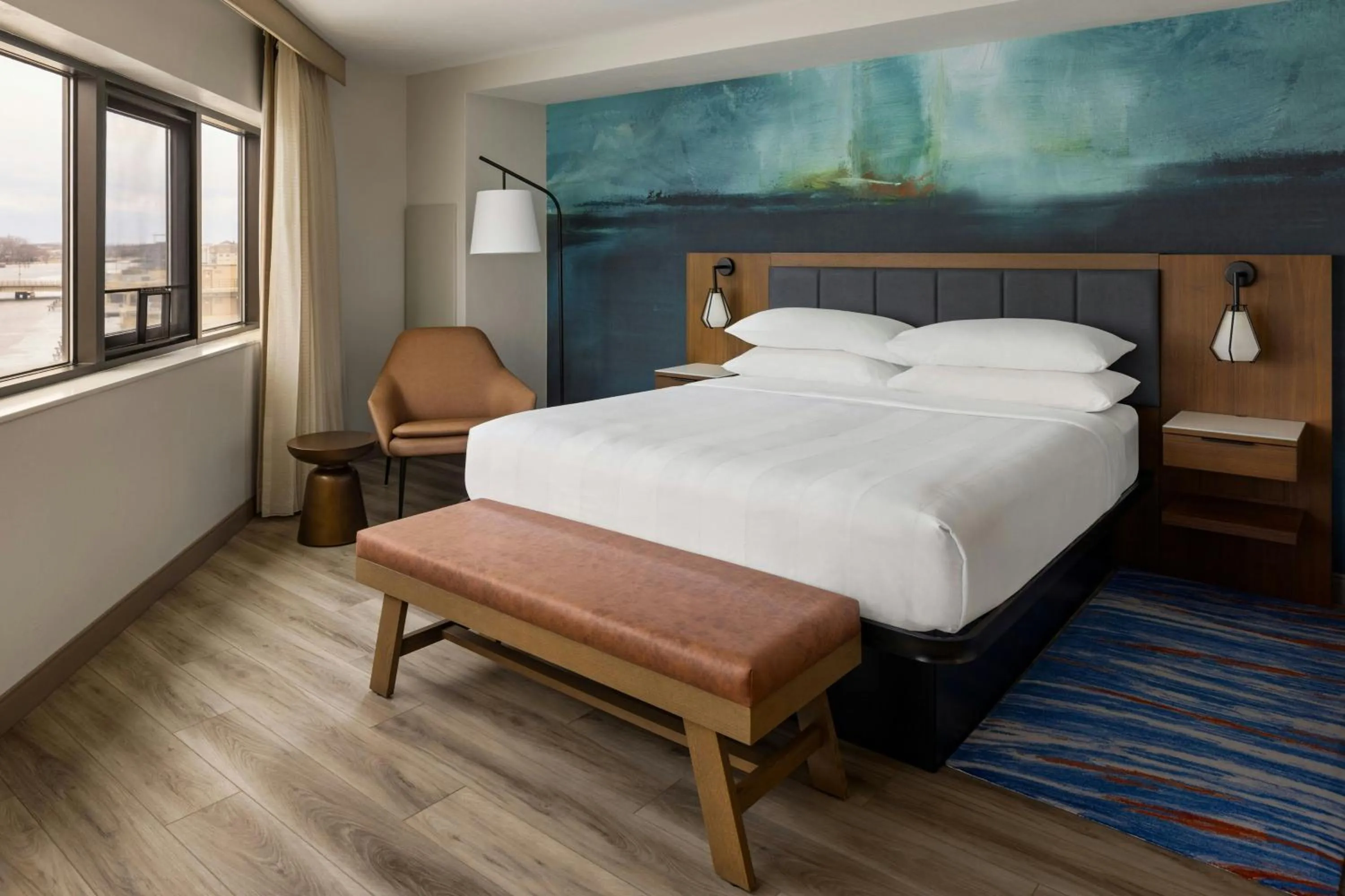 Photo of the whole room, Bed in Oshkosh Marriott Waterfront Hotel & Convention Center