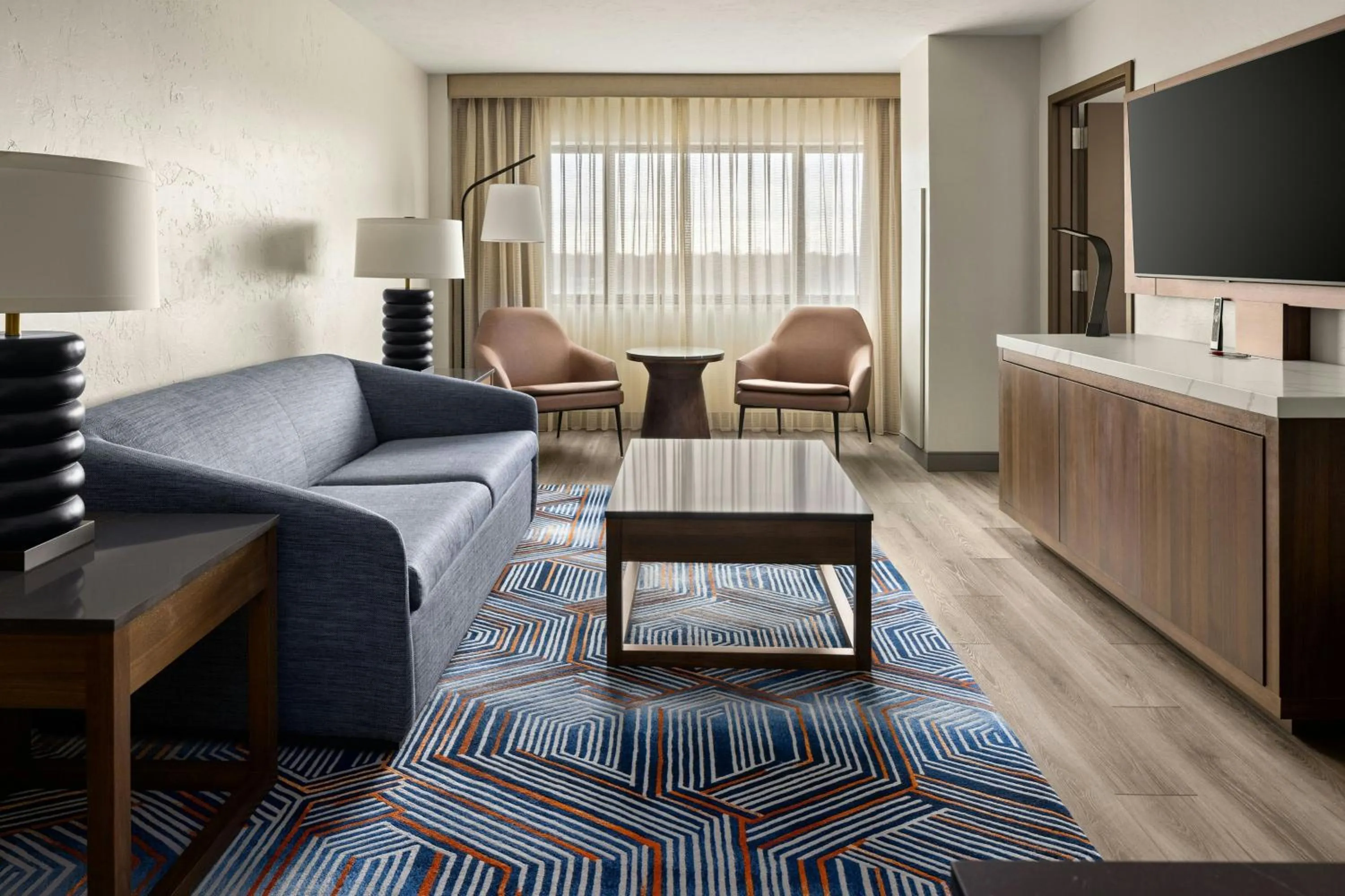 Living room in Oshkosh Marriott Waterfront Hotel & Convention Center