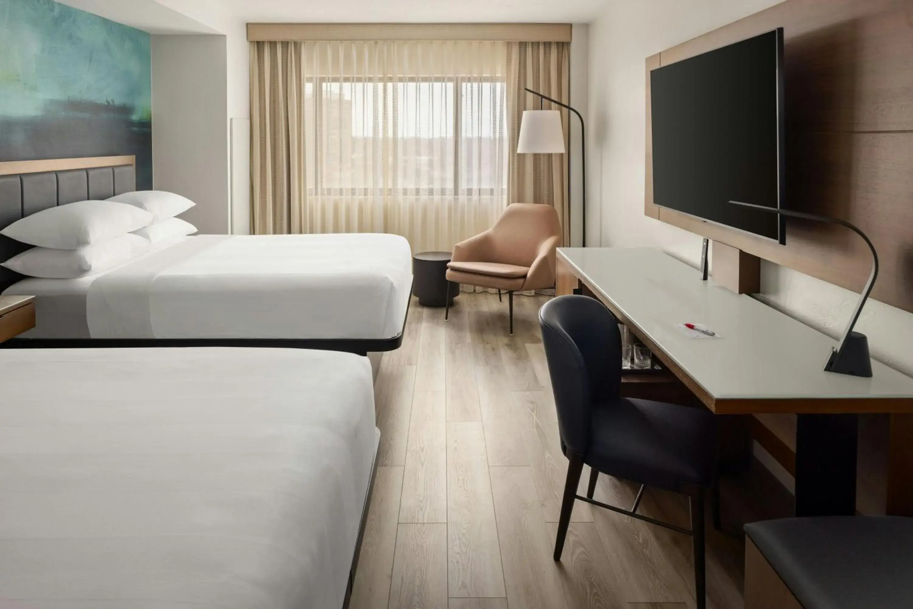 Double Queen Room with Two Queen Beds and Waterview in Oshkosh Marriott Waterfront Hotel & Convention Center Double Queen Room with Two Queen Beds and Waterview in Oshkosh Marriott Waterfront Hotel & Convention Center