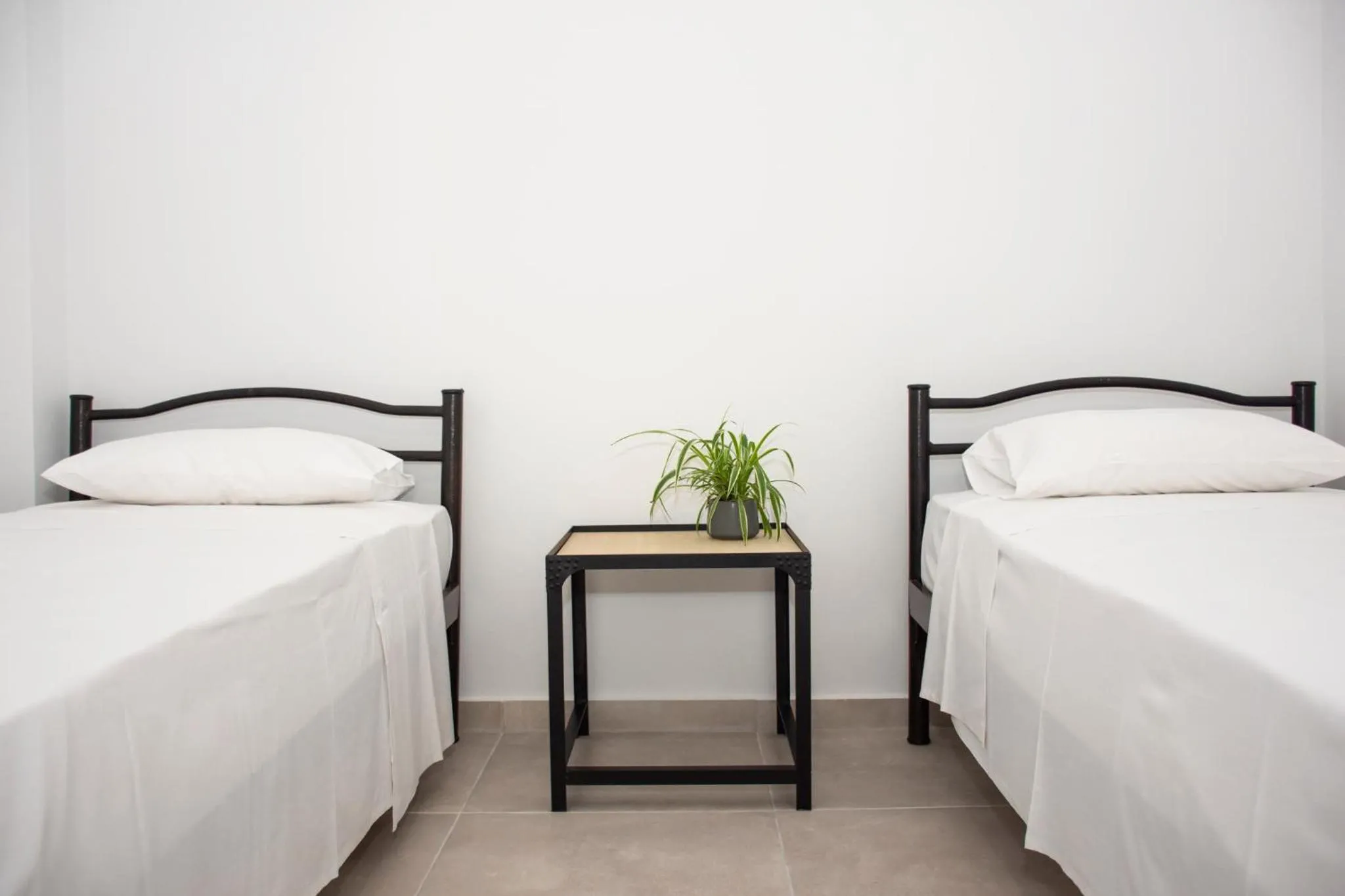 Photo of the whole room, Bed in Christina Apartment