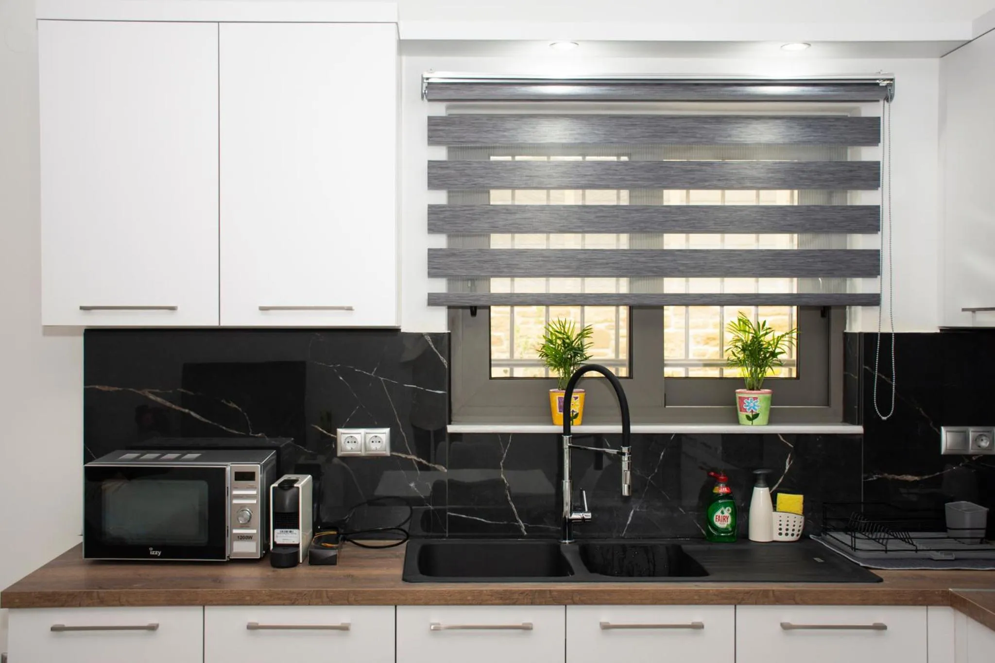 Kitchen or kitchenette in Christina Apartment