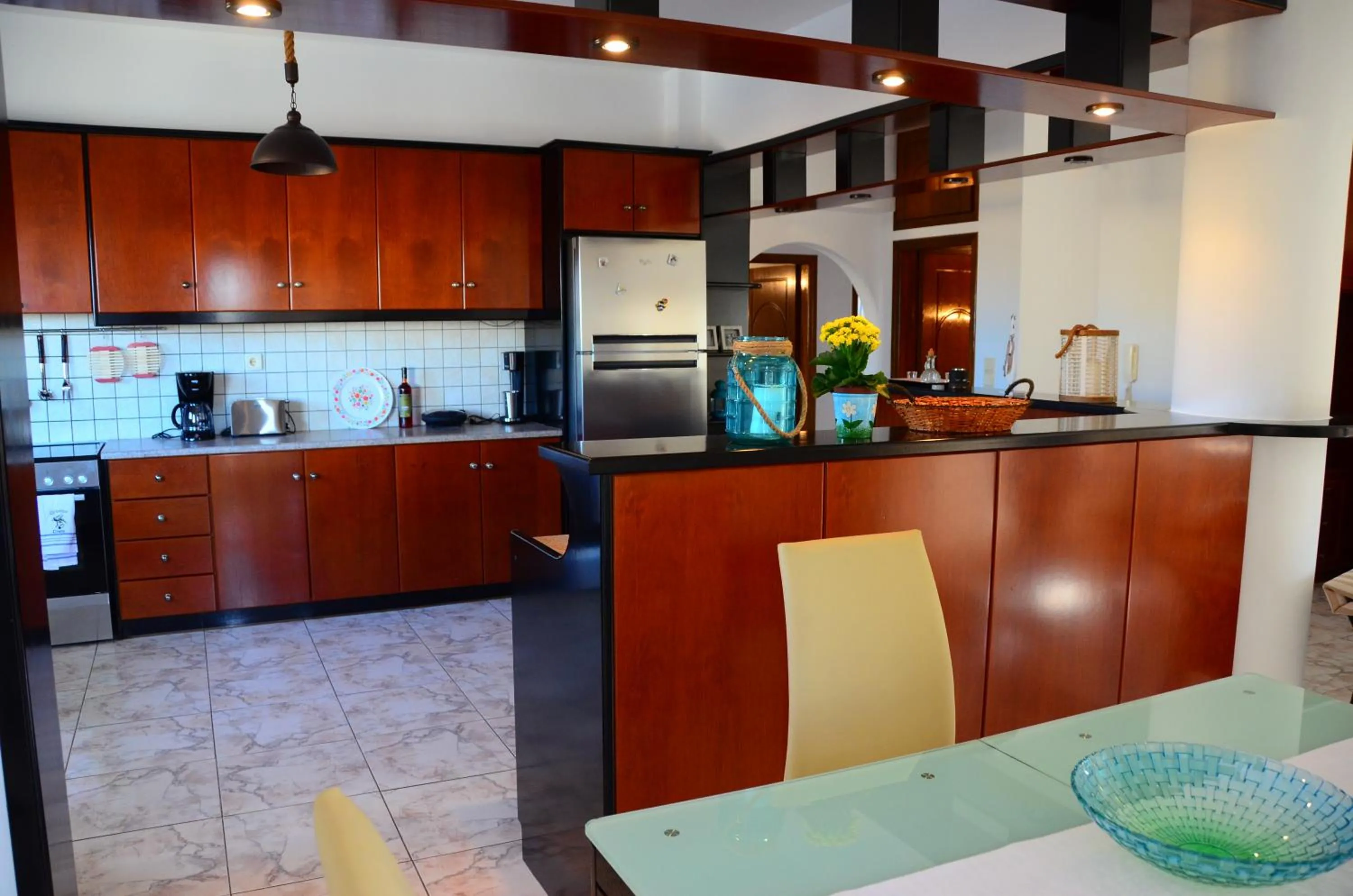 Kitchen or kitchenette in Christina Apartment
