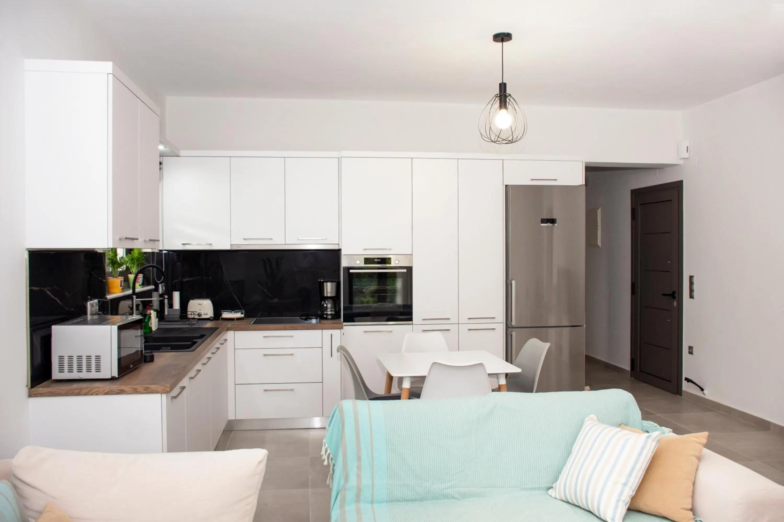 Kitchen or kitchenette in Christina Apartment