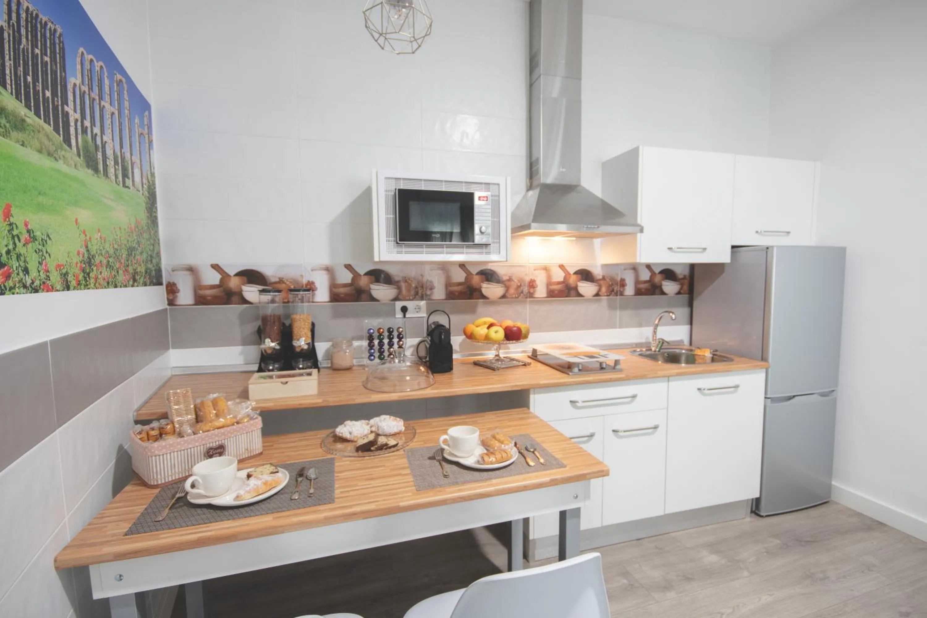 Kitchen or kitchenette in Apartamentos Coso de San Albin