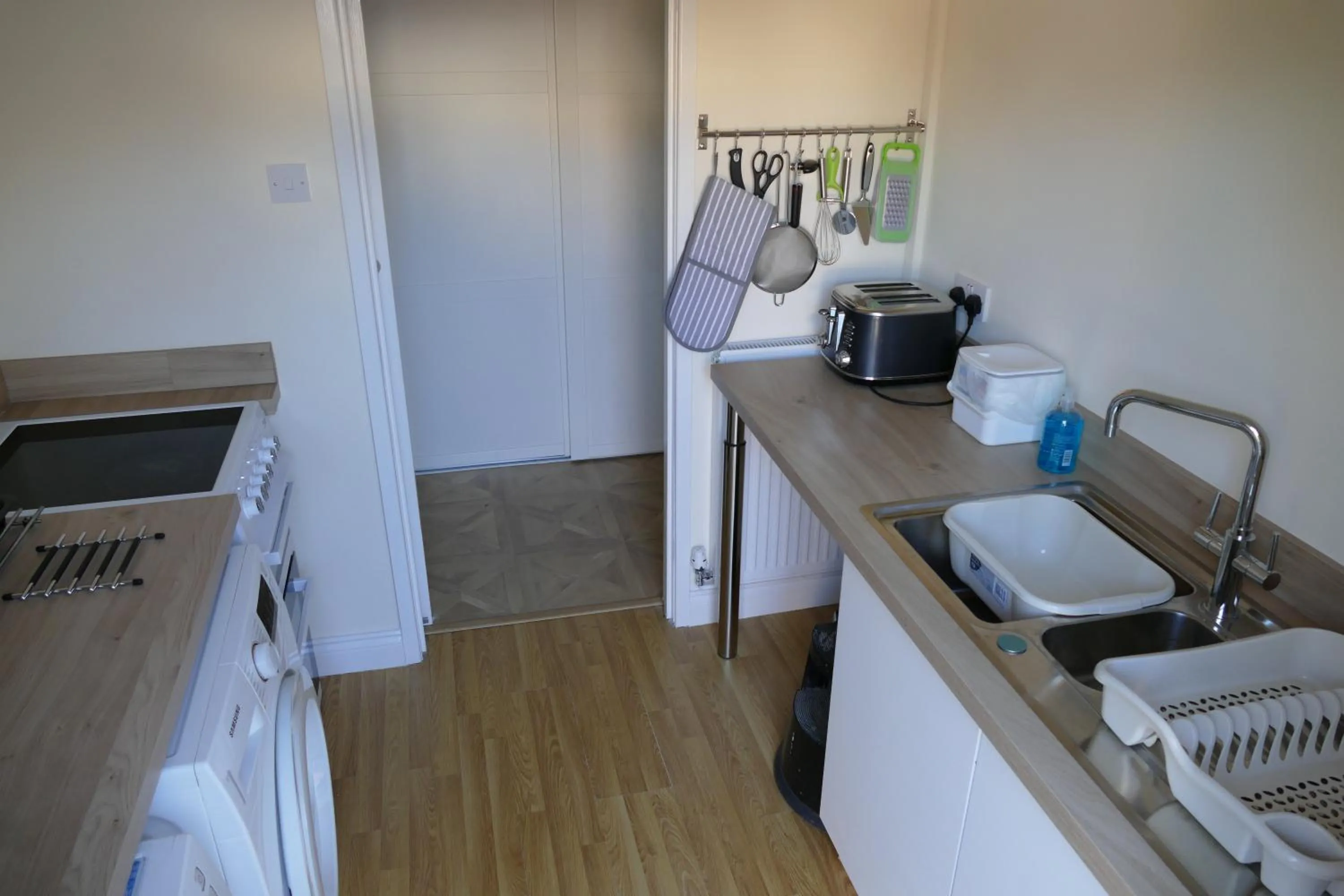 Communal kitchen in Magnolia Self Contained Suites