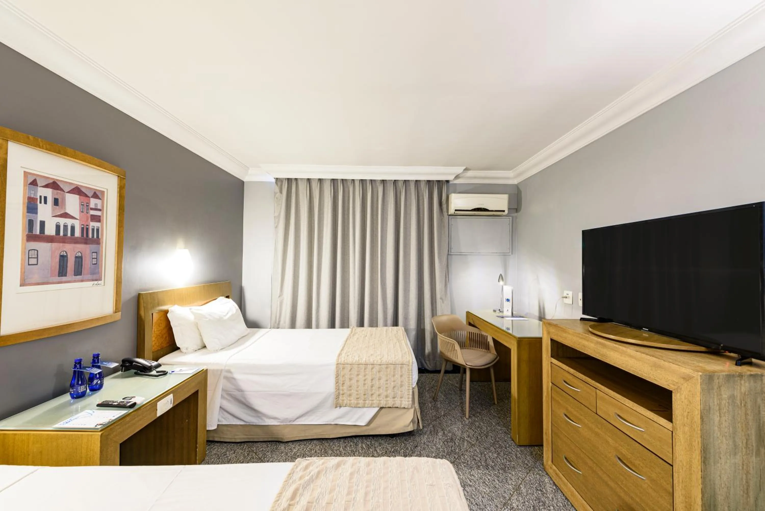 Bed in Plaza Inn Executive