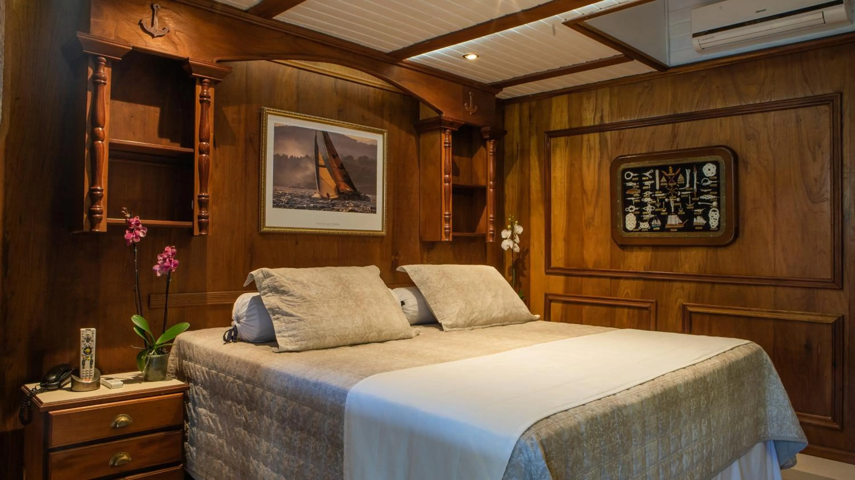 Bed in Plaza Inn Pousada do Capitão