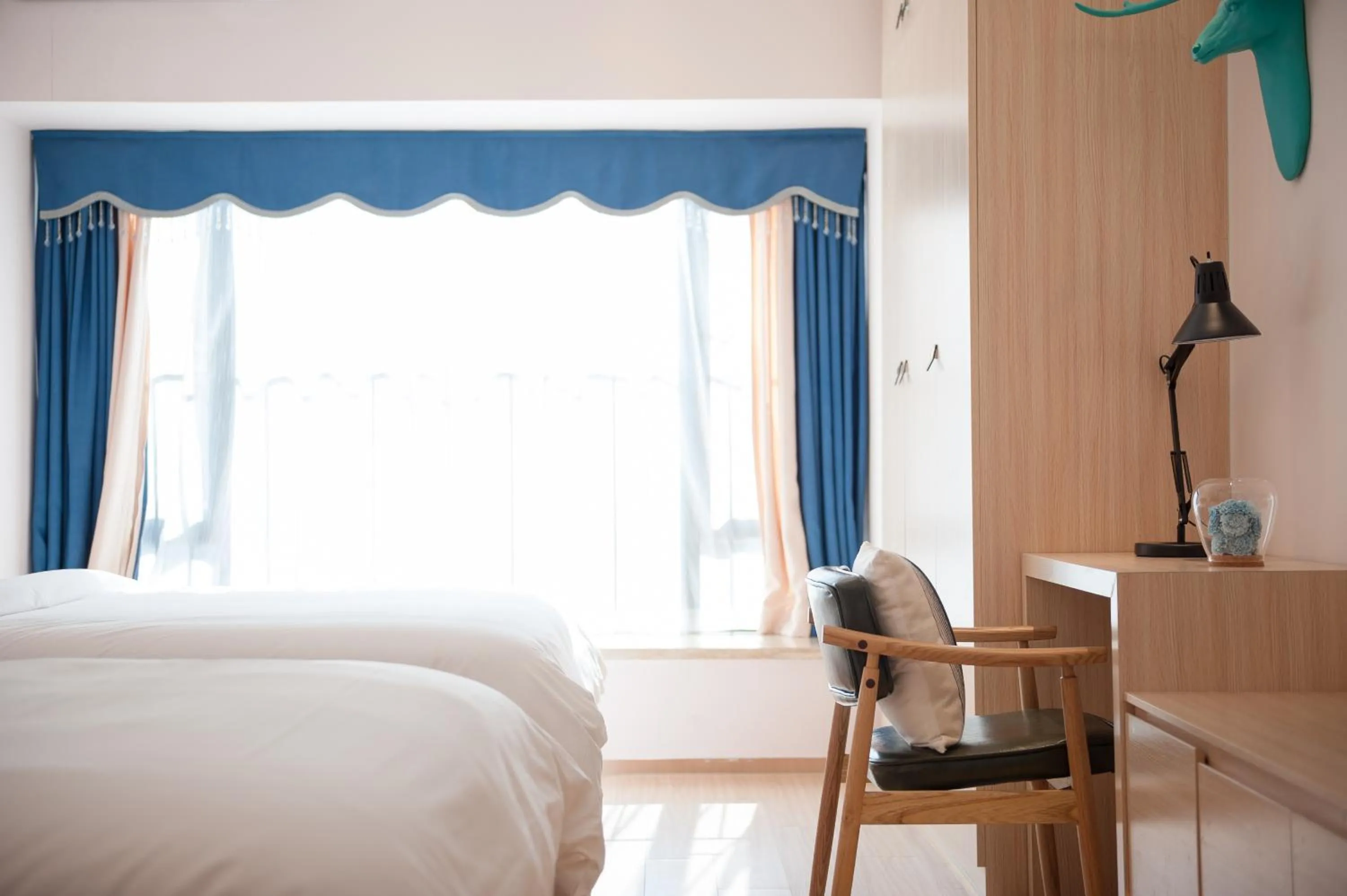 Bed in Yumi Huanju Apartment -广州东站 燕塘地铁站店