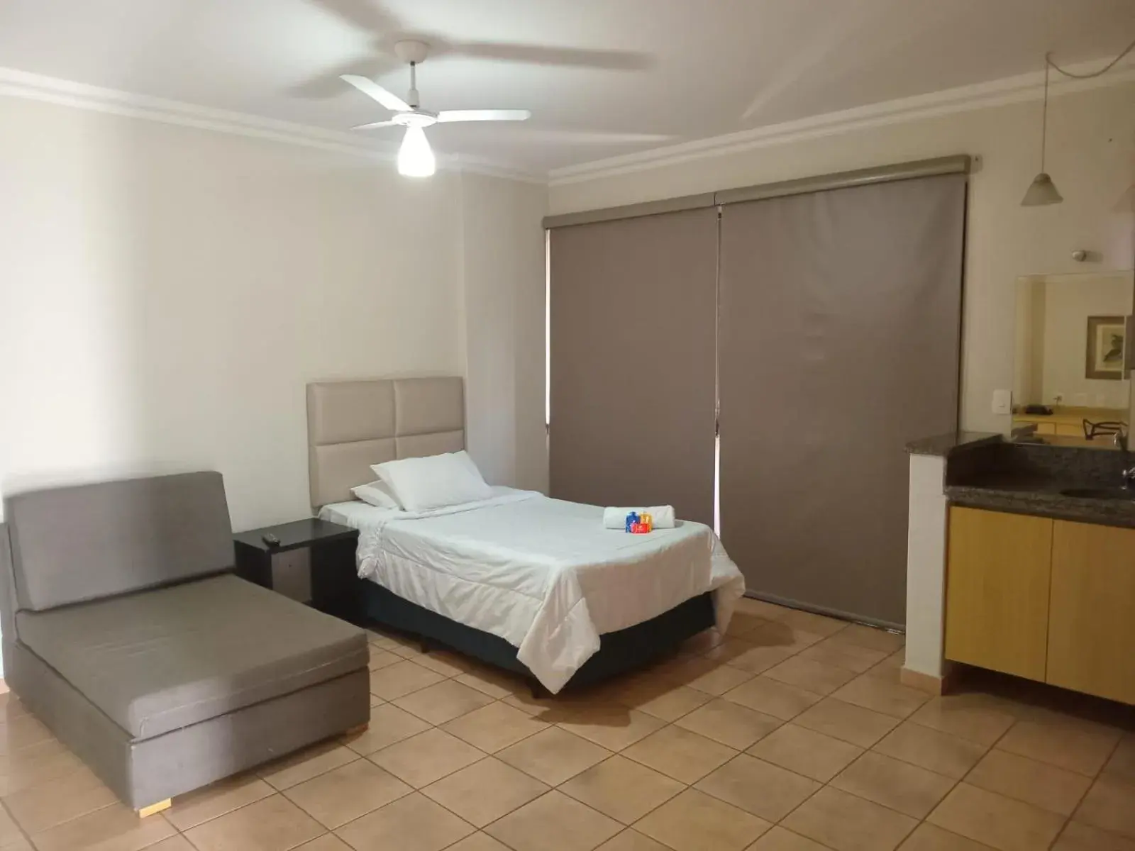 Living room, Bed in Plaza Inn Flat Araxá Living room, Bed in Plaza Inn Flat Araxá