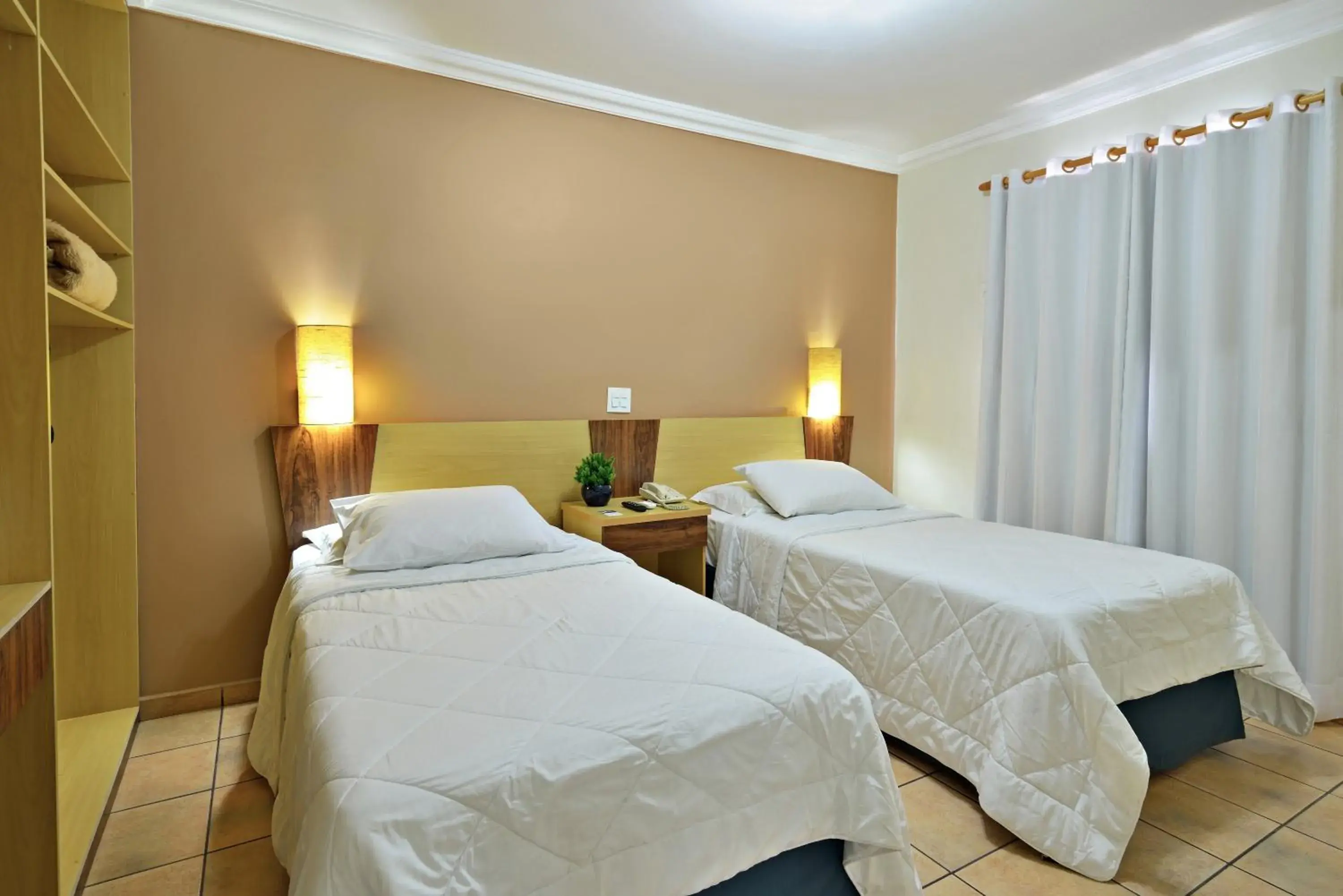 Bed in Plaza Inn Flat Araxá Bed in Plaza Inn Flat Araxá