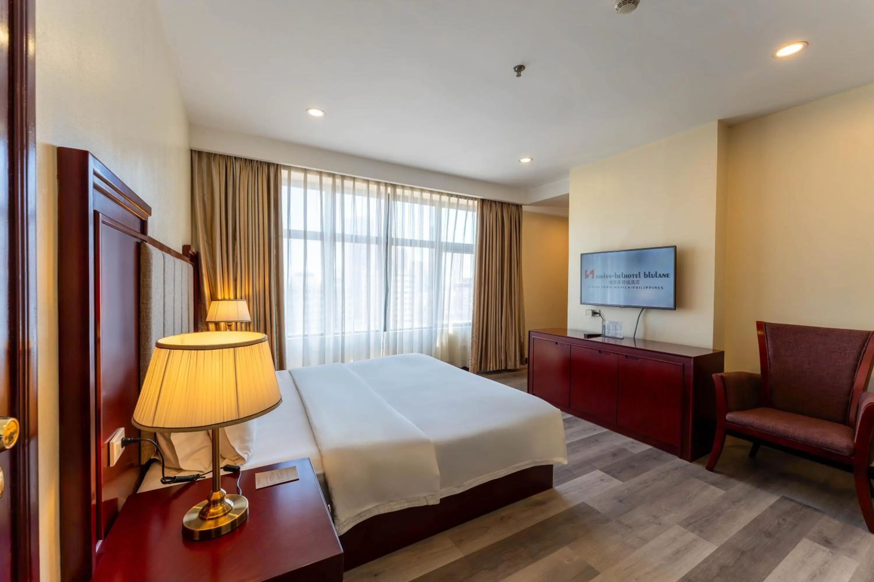 Photo of the whole room, Bed in Swiss-Belhotel Blulane